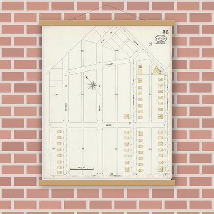 Old map wall art mockup — magnetic wood frame on brick wall — Sanborn Fire Insurance Map from Butler, Butler County, Pennsylvania (1906), Sheet #0036