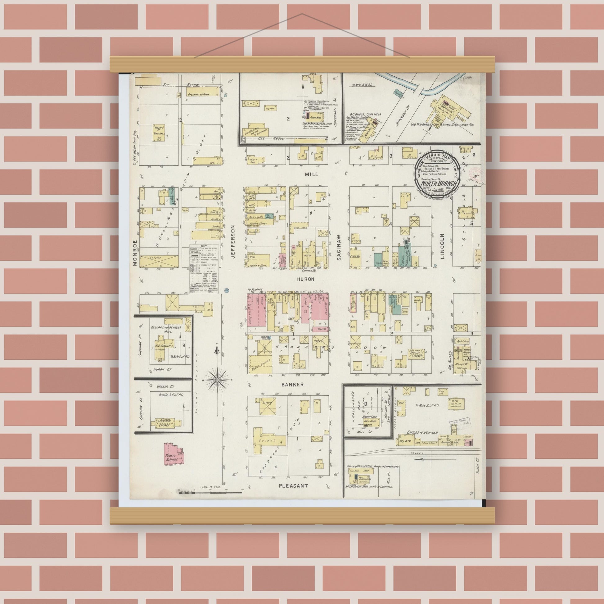 Old map wall art mockup — magnetic wood frame on brick wall — Sanborn Fire Insurance Map from North Branch, Lapeer County, Michigan (1895), Sheet #0001
