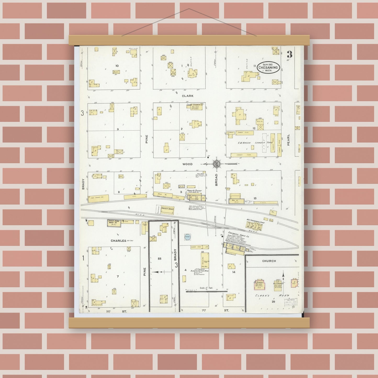 Old map wall art mockup — magnetic wood frame on brick wall — Sanborn Fire Insurance Map from Chesaning, Saginaw County, Michigan (1910), Sheet #0003