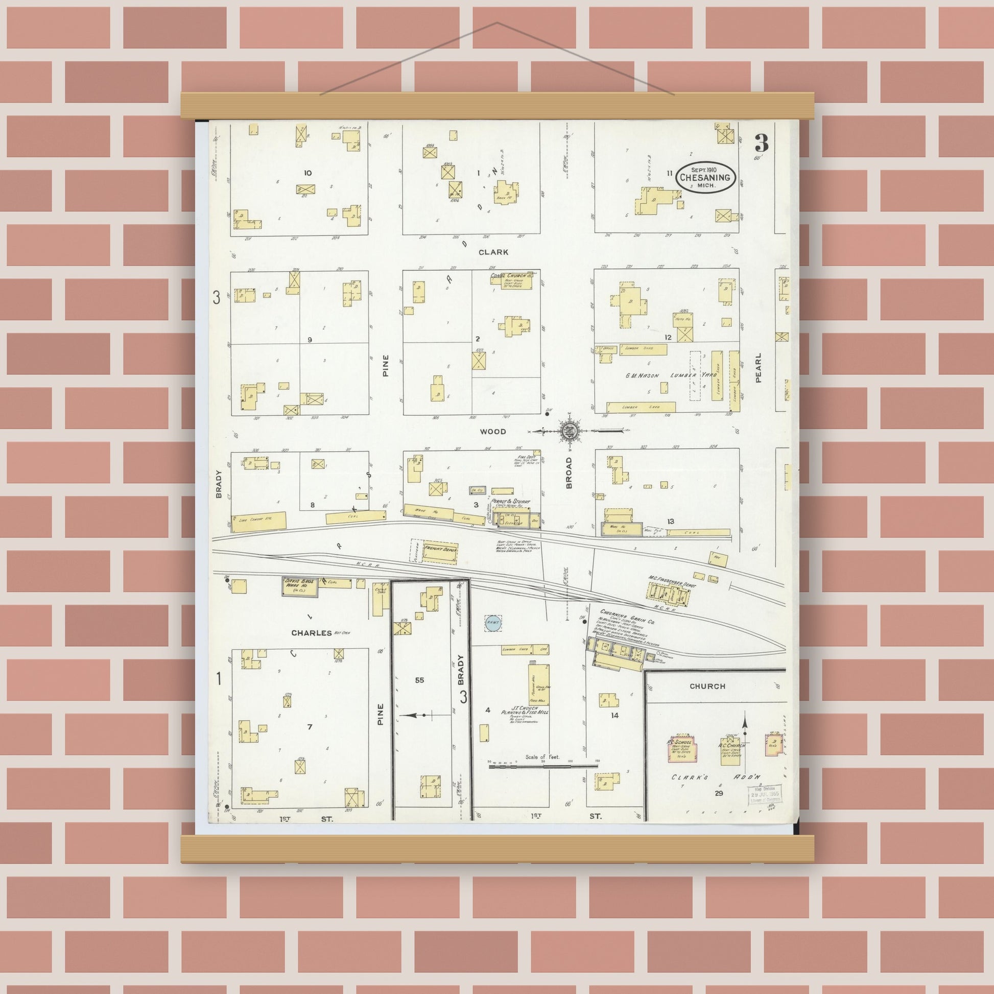 Old map wall art mockup — magnetic wood frame on brick wall — Sanborn Fire Insurance Map from Chesaning, Saginaw County, Michigan (1910), Sheet #0003