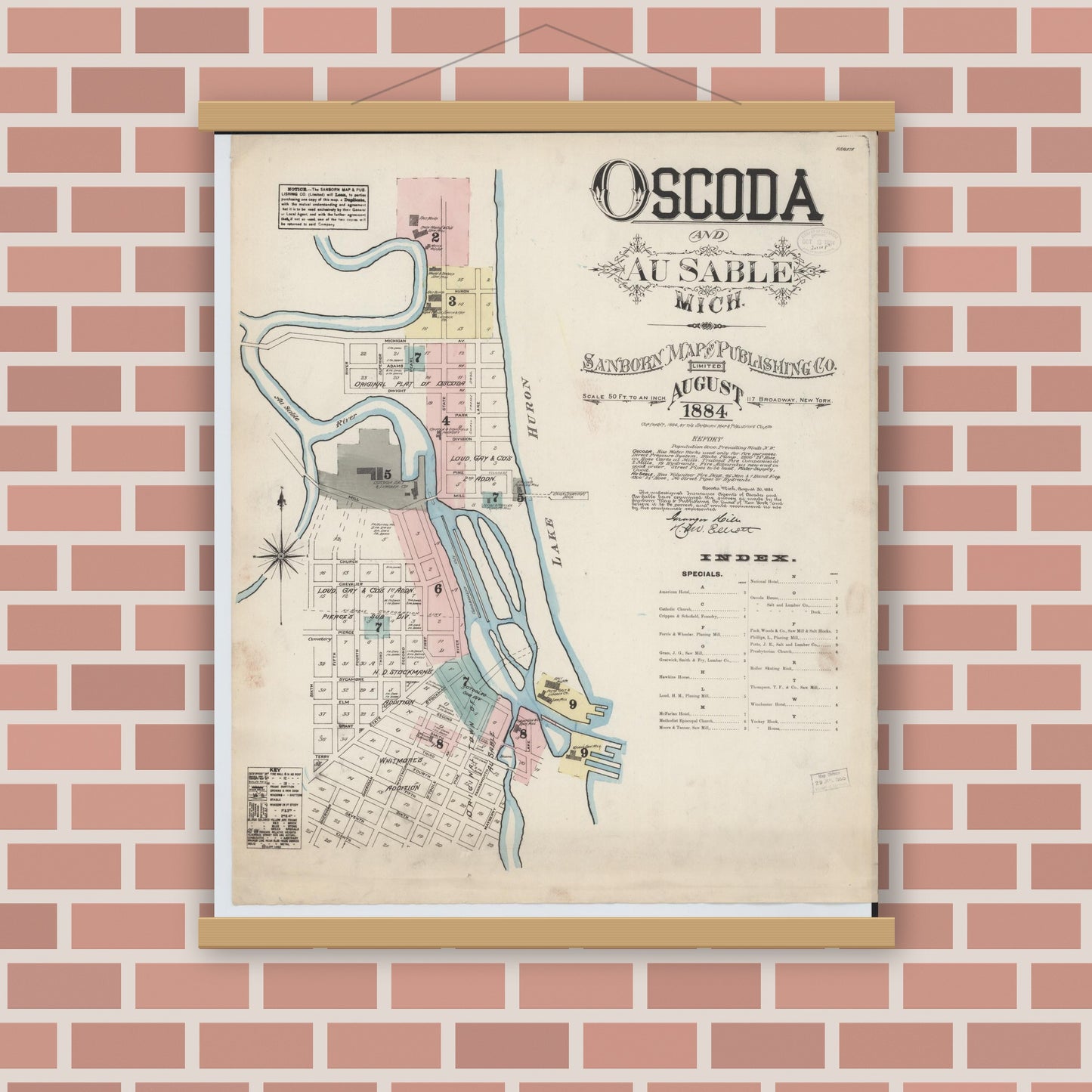 Old map wall art mockup — magnetic wood frame on brick wall — Sanborn Fire Insurance Map from Oscoda, Iosco County, Michigan (1884), Sheet #0001