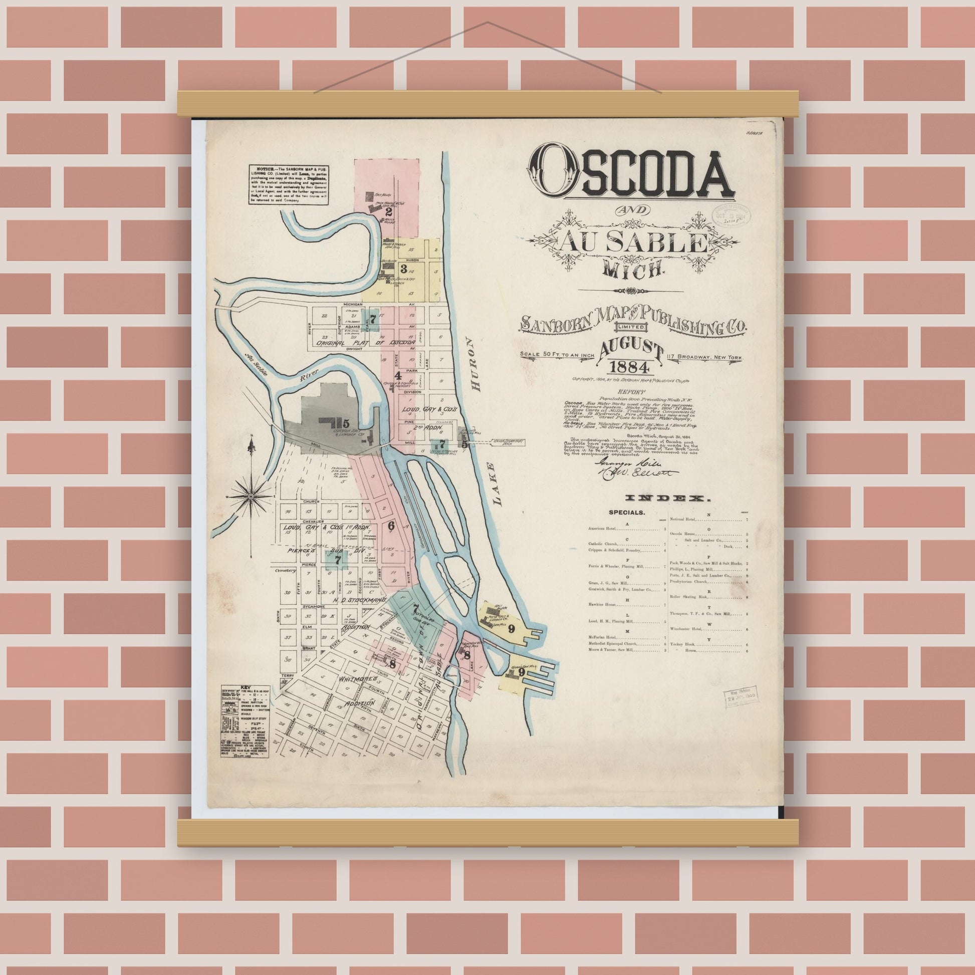 Old map wall art mockup — magnetic wood frame on brick wall — Sanborn Fire Insurance Map from Oscoda, Iosco County, Michigan (1884), Sheet #0001