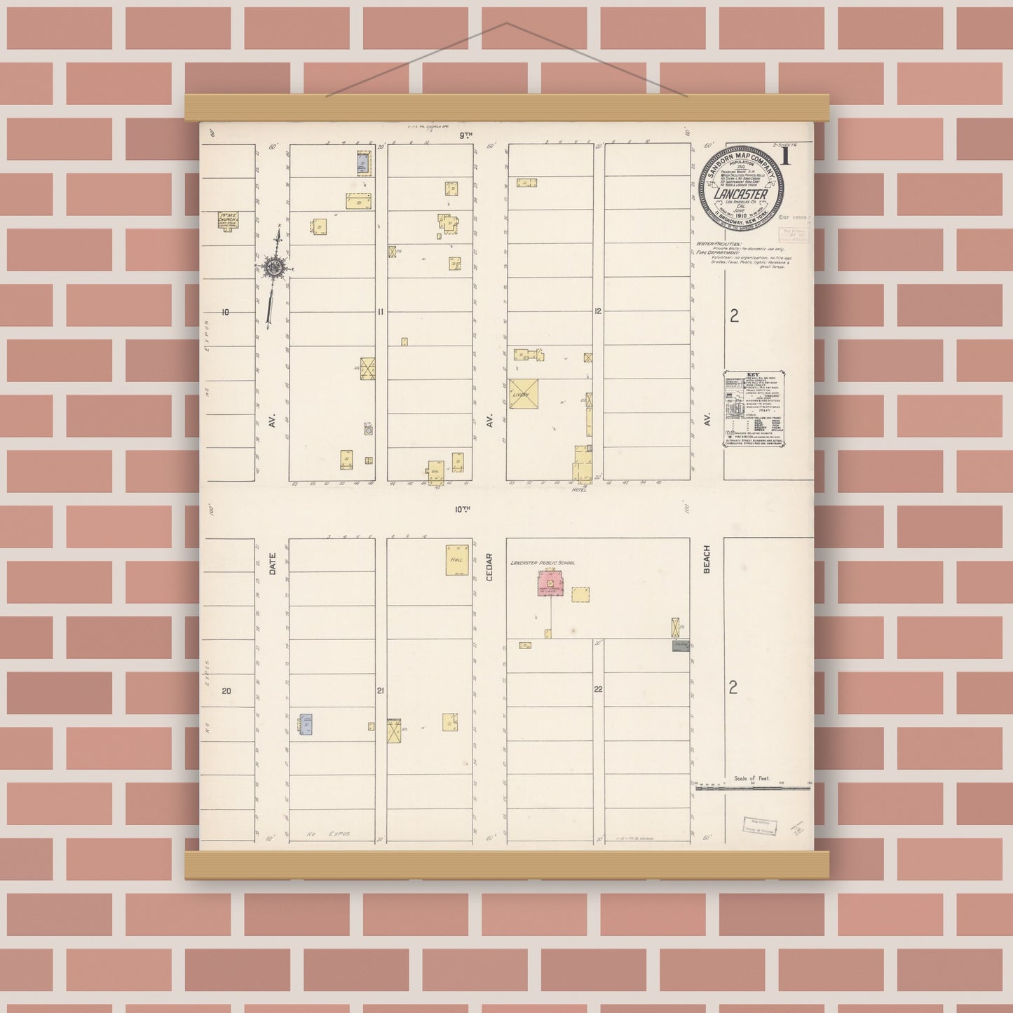 Old map wall art mockup — magnetic wood frame on brick wall — Sanborn Fire Insurance Map from Lancaster, Los Angeles County, California (1910), Sheet #0001