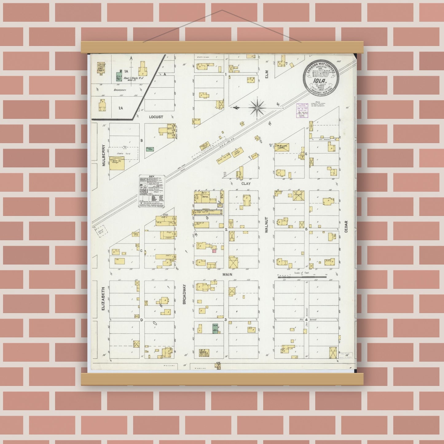 Old map wall art mockup — magnetic wood frame on brick wall — Sanborn Fire Insurance Map from Iola, Clay County, Illinois (1902), Sheet #0001