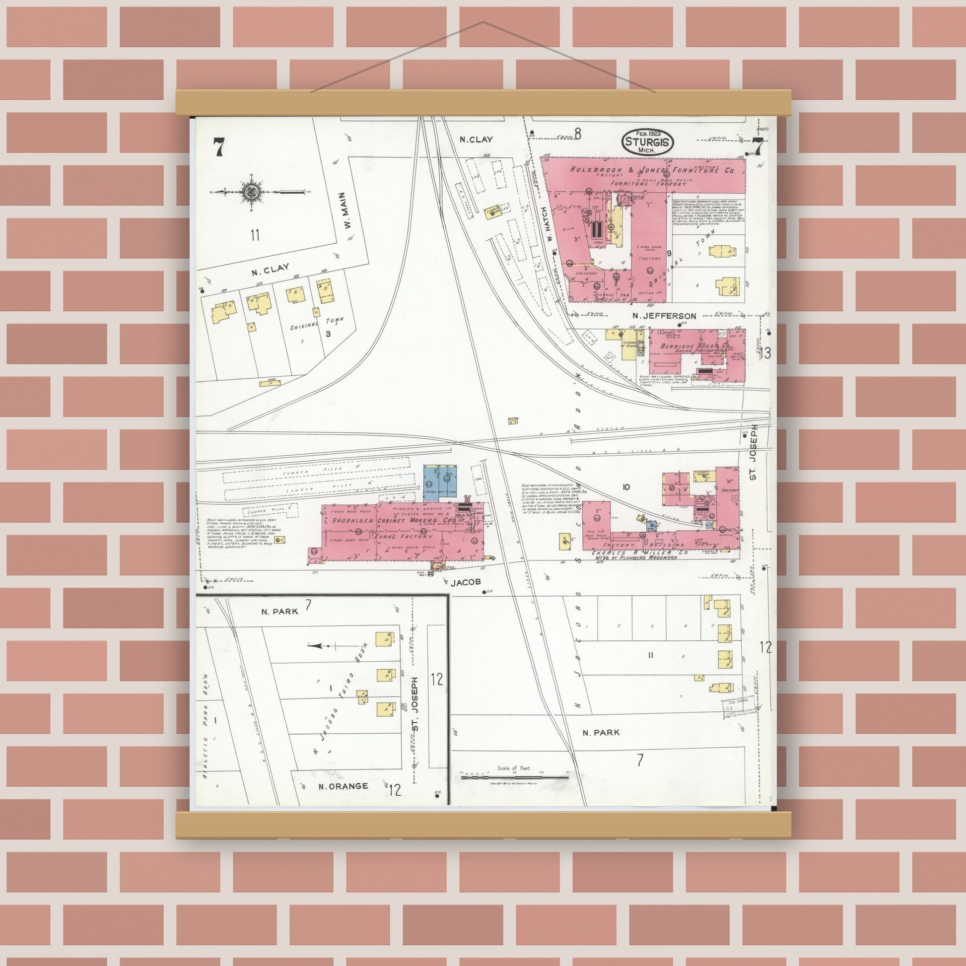 Old map wall art mockup — magnetic wood frame on brick wall — Sanborn Fire Insurance Map from Sturgis, Saint Joseph County, Michigan (1923), Sheet #0007