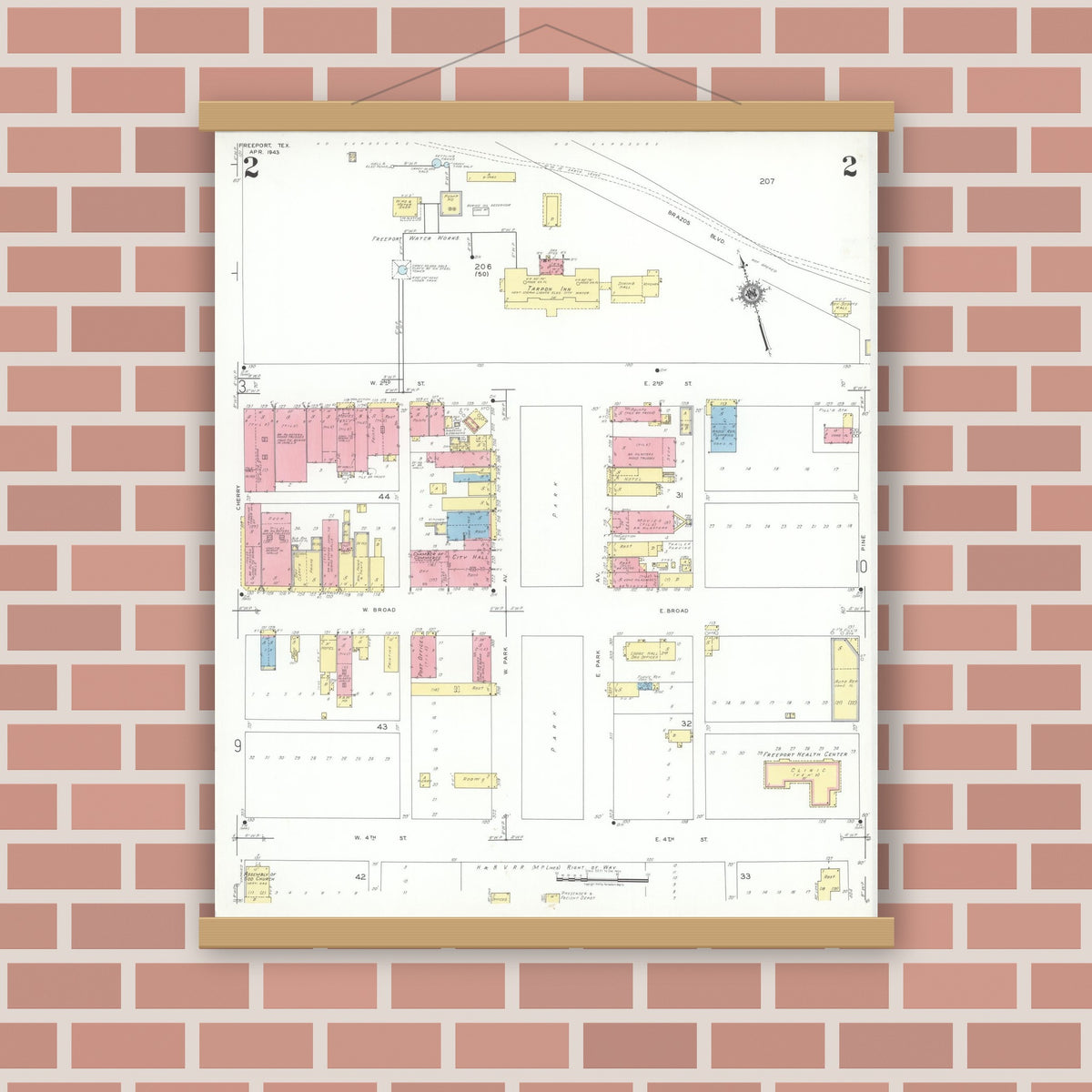 Old map wall art mockup — magnetic wood frame on brick wall — Sanborn Fire Insurance Map from Freeport, Brazoria County, Texas (1943), Sheet #0002