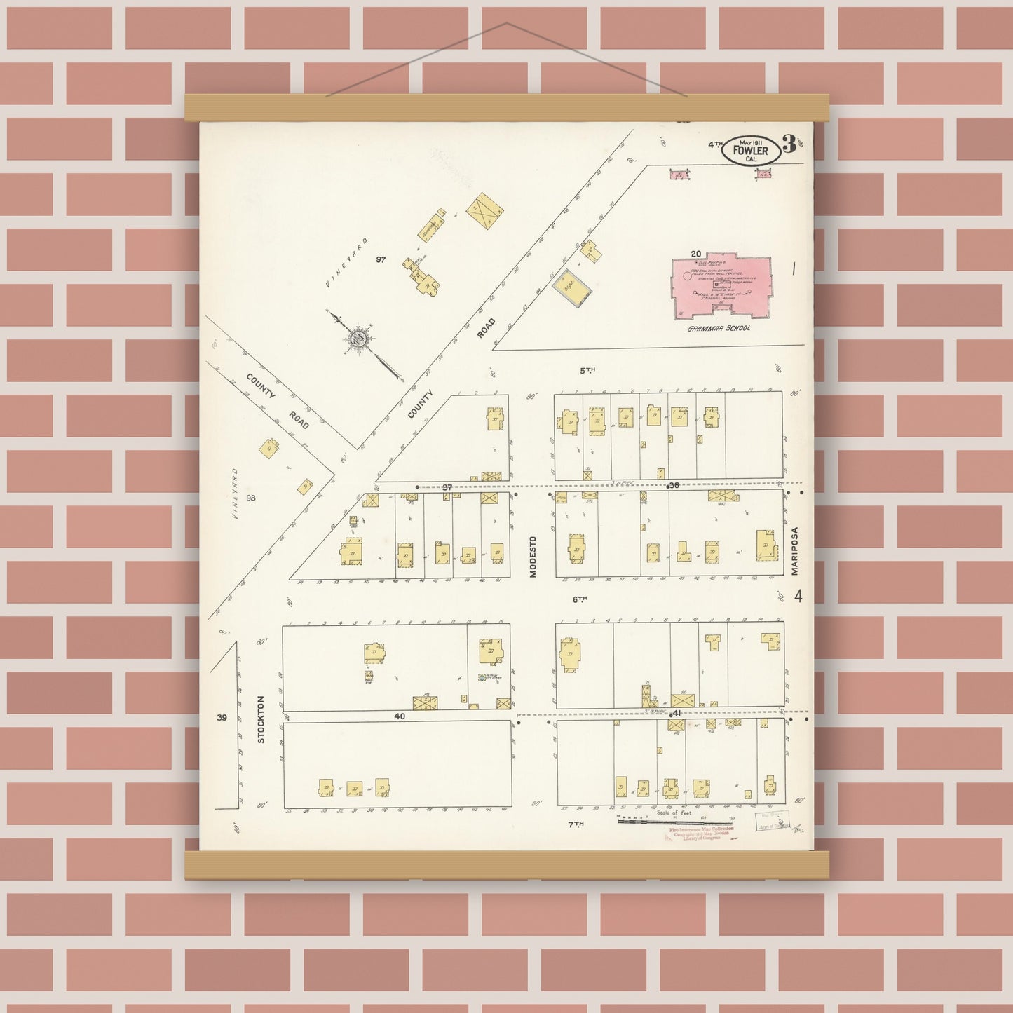 Old map wall art mockup — magnetic wood frame on brick wall — Sanborn Fire Insurance Map from Fowler, Fresno County, California (1911), Sheet #0003