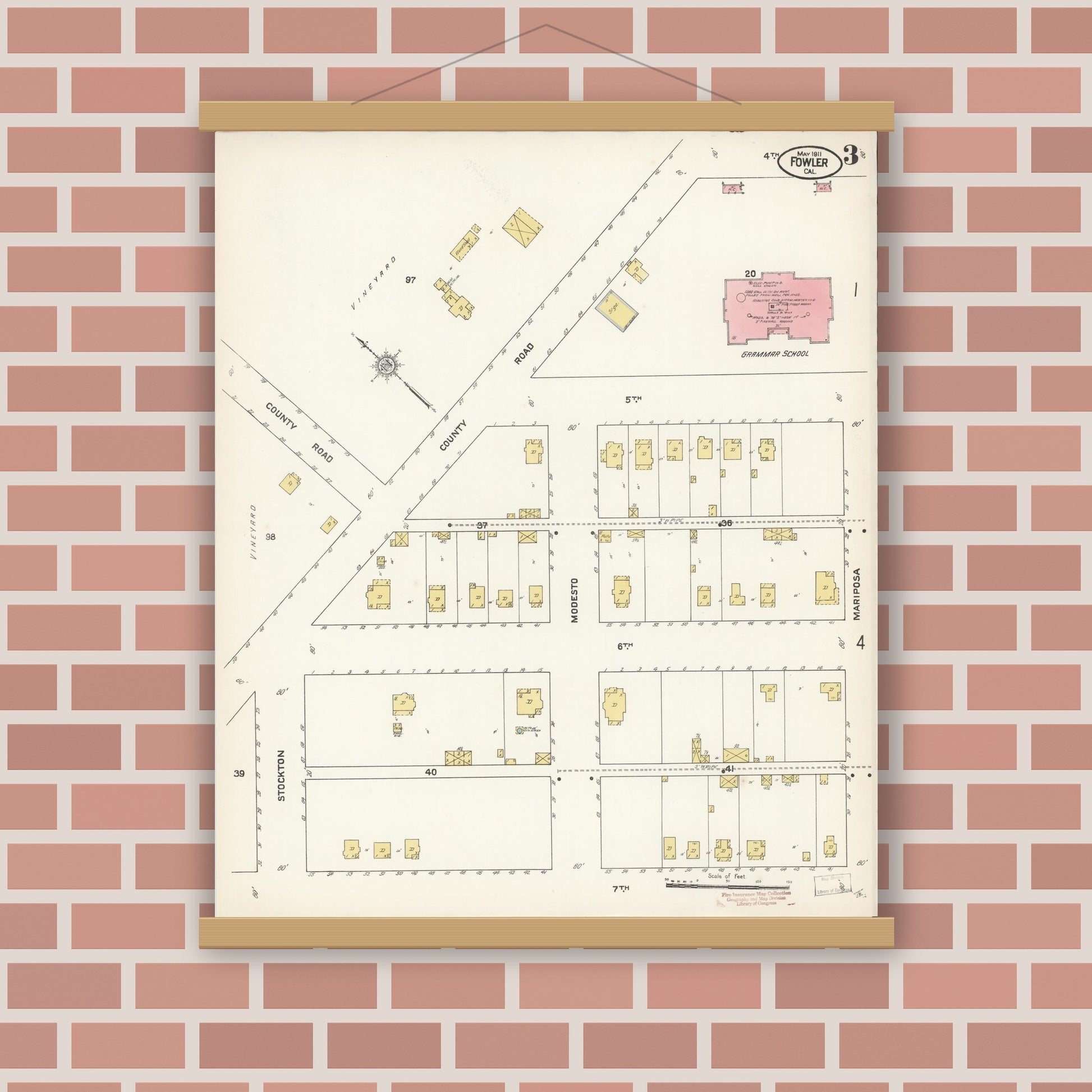 Old map wall art mockup — magnetic wood frame on brick wall — Sanborn Fire Insurance Map from Fowler, Fresno County, California (1911), Sheet #0003