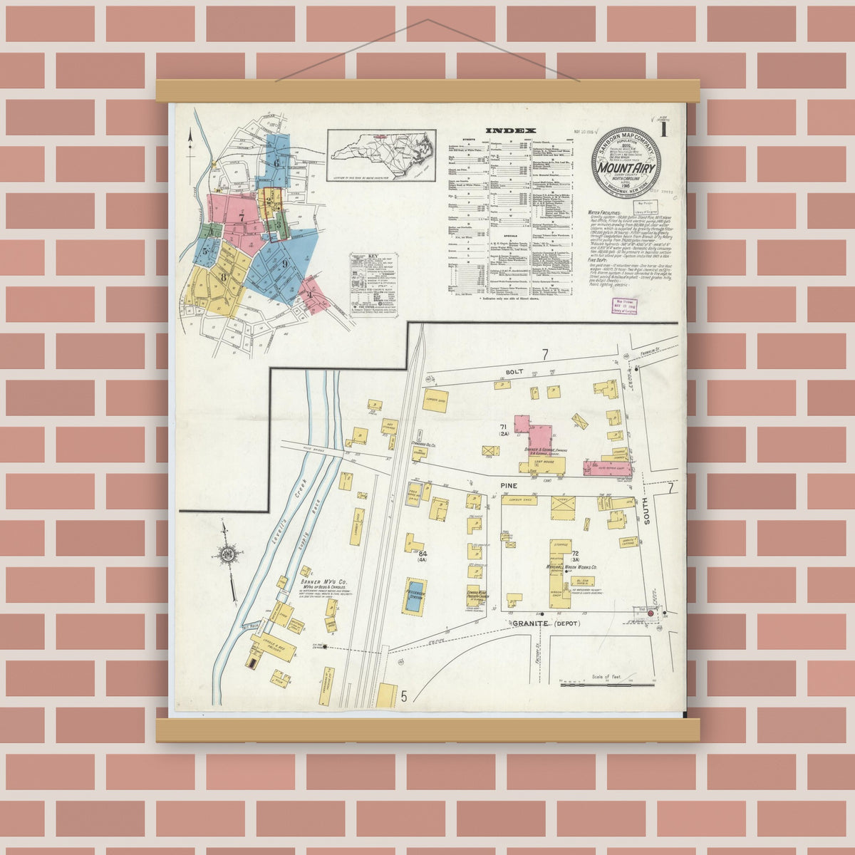 Old map wall art mockup — magnetic wood frame on brick wall — Sanborn Fire Insurance Map from Mount Airy, Surry County, North Carolina (1916), Sheet #0001