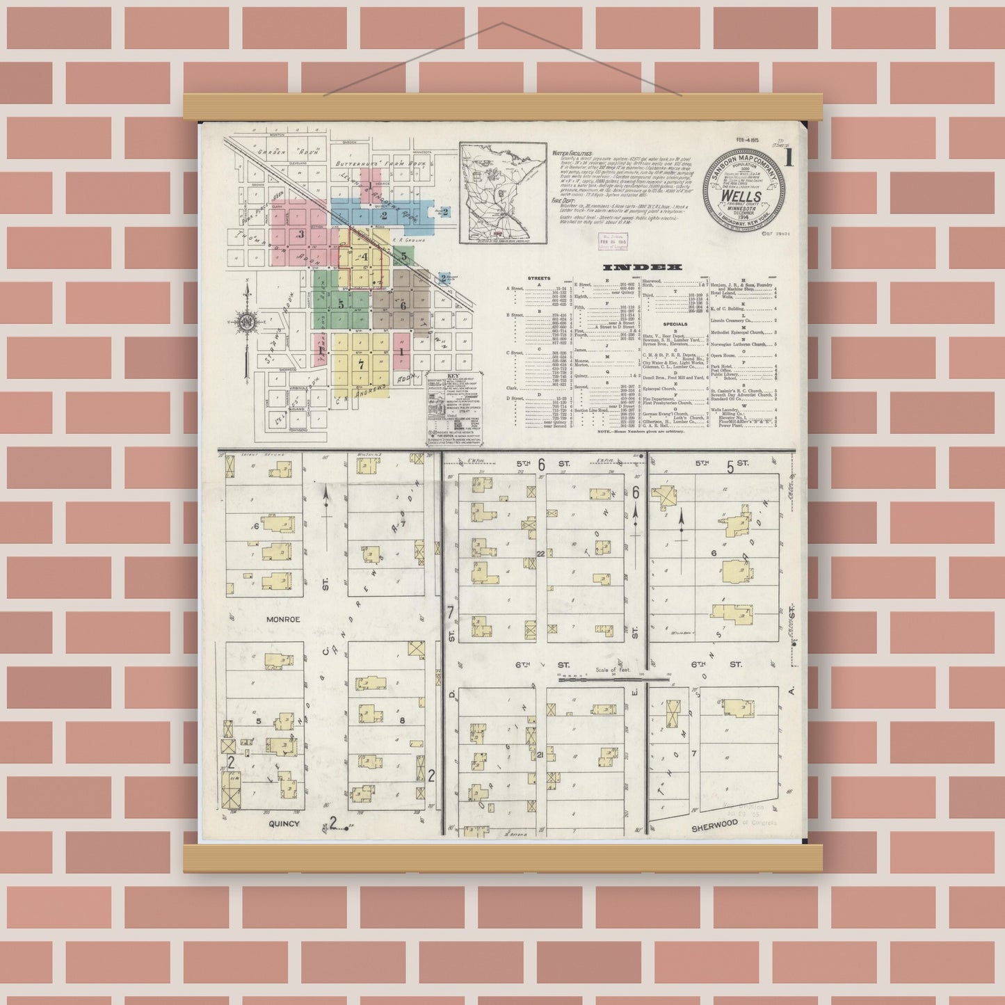 Old map wall art mockup — magnetic wood frame on brick wall — Sanborn Fire Insurance Map from Wells, Faribault County, Minnesota (1914), Sheet #0001