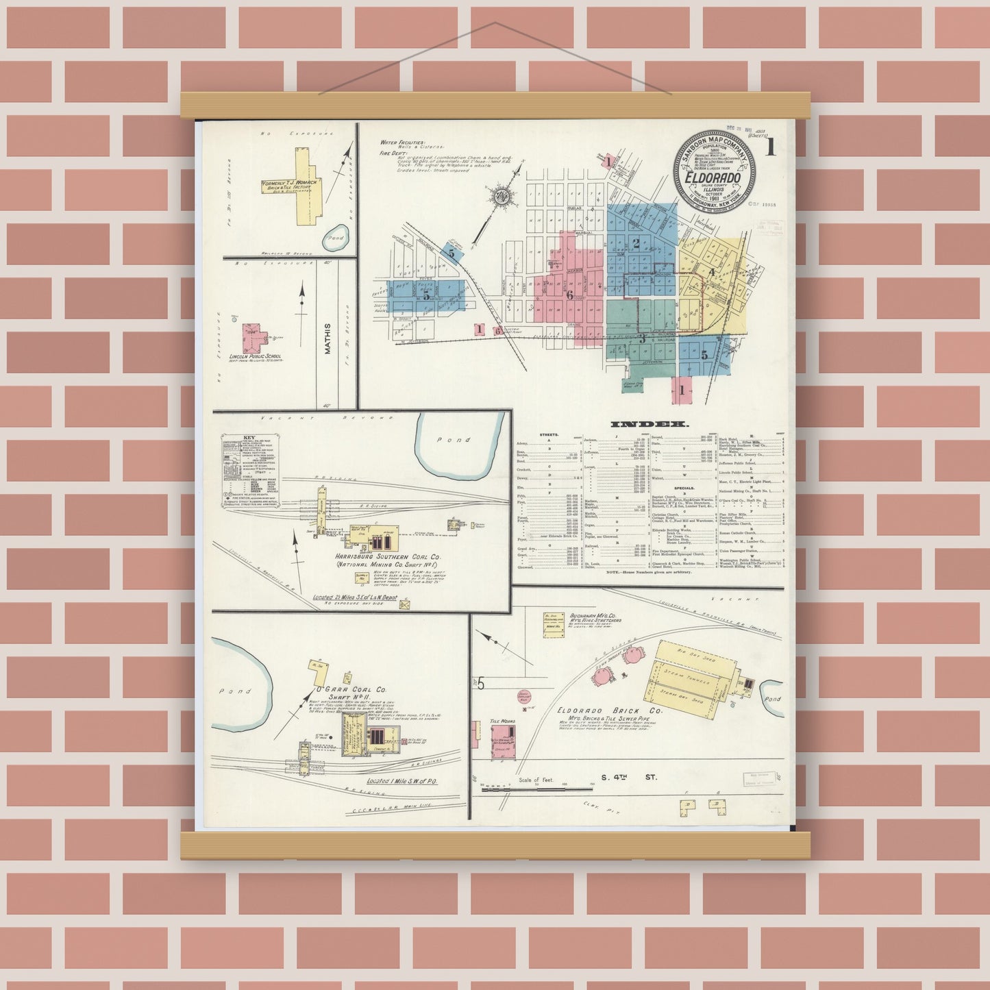Old map wall art mockup — magnetic wood frame on brick wall — Sanborn Fire Insurance Map from Eldorado, Saline County, Illinois (1911), Sheet #0001