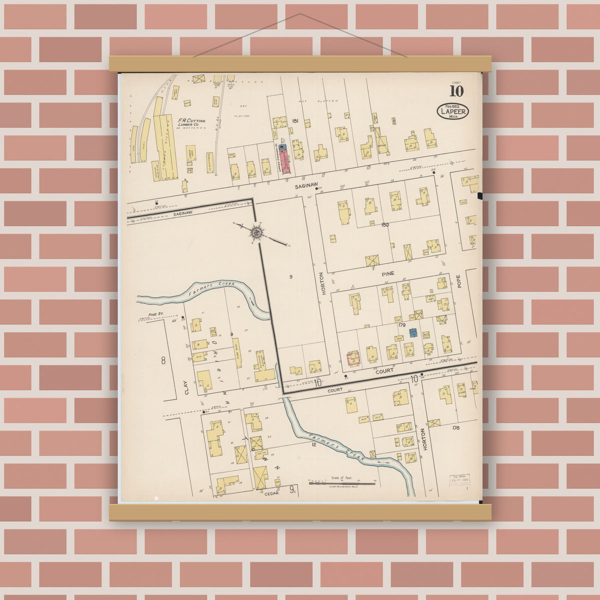 Old map wall art mockup — magnetic wood frame on brick wall — Sanborn Fire Insurance Map from Lapeer, Lapeer County, Michigan (1922), Sheet #0010