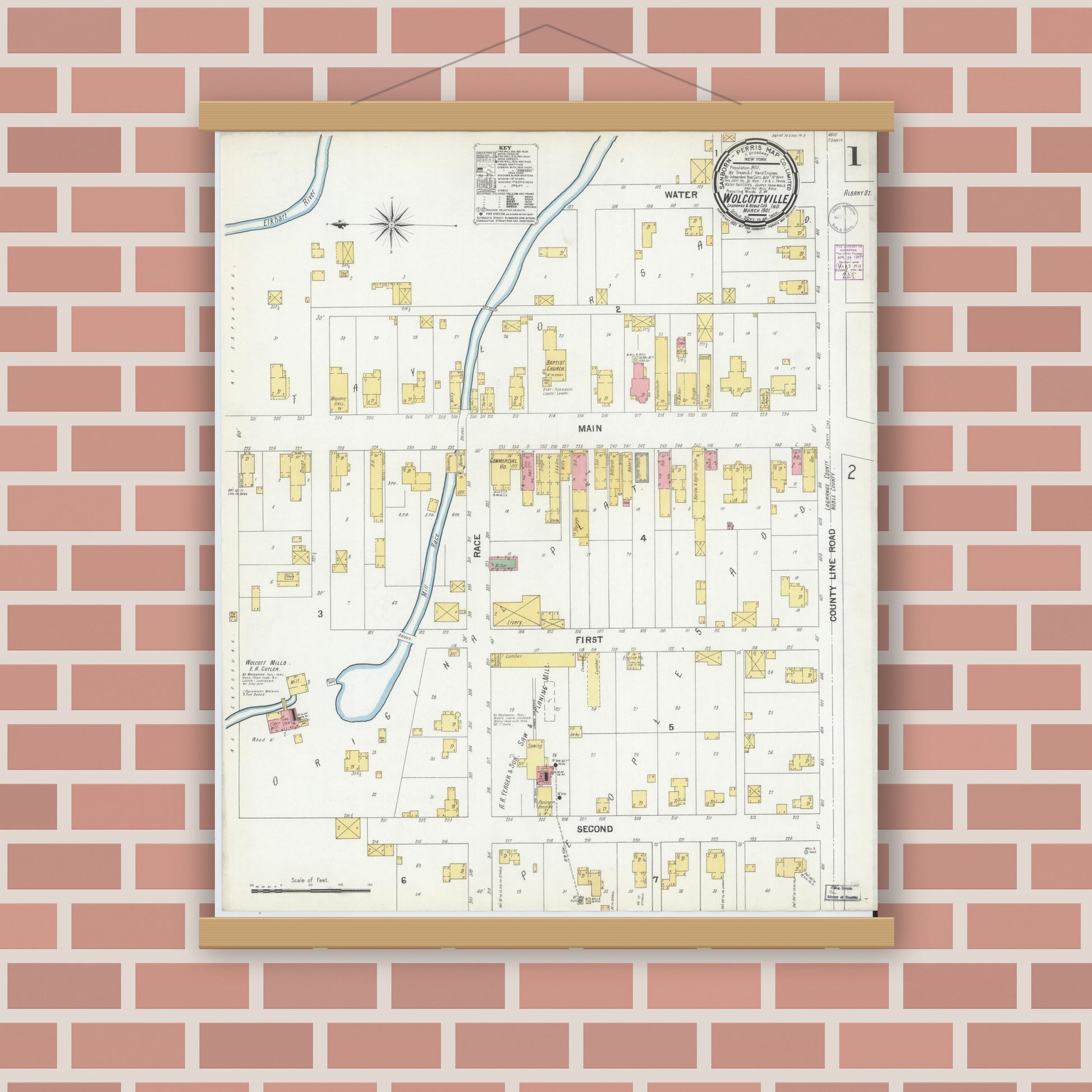Old map wall art mockup — magnetic wood frame on brick wall — Sanborn Fire Insurance Map from Wolcottville, Noble And LaGrange Counties, Indiana (1901), Sheet #0001
