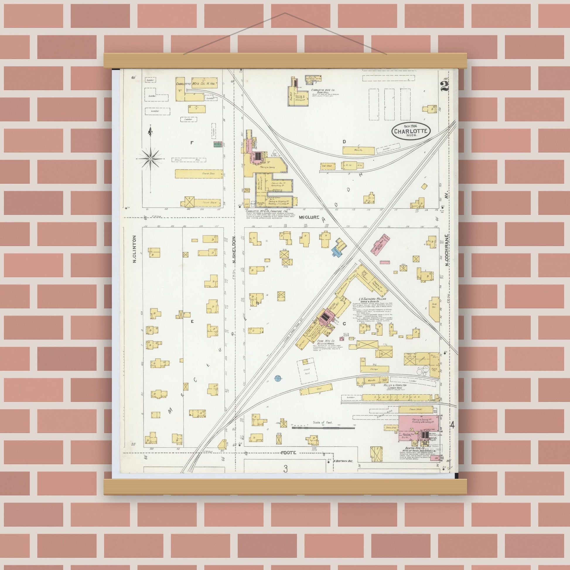 Old map wall art mockup — magnetic wood frame on brick wall — Sanborn Fire Insurance Map from Charlotte, Eaton County, Michigan (1904), Sheet #0002