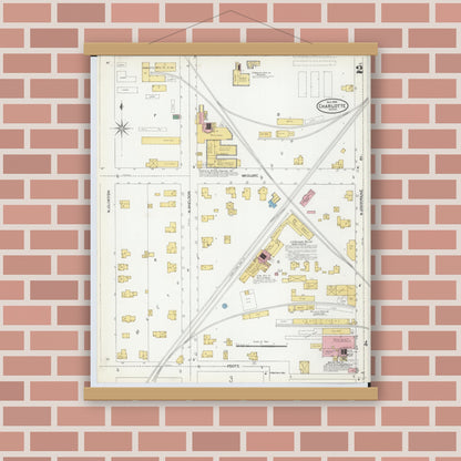 Old map wall art mockup — magnetic wood frame on brick wall — Sanborn Fire Insurance Map from Charlotte, Eaton County, Michigan (1904), Sheet #0002