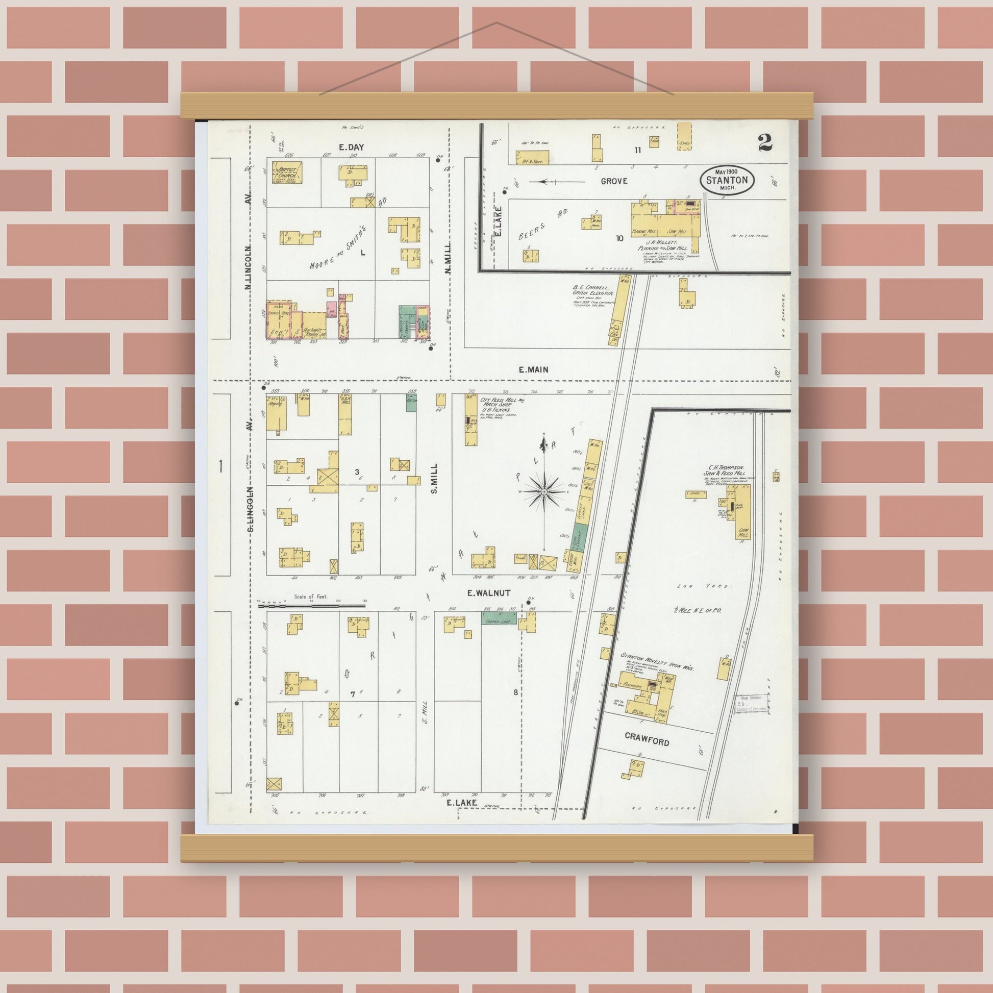 Old map wall art mockup — magnetic wood frame on brick wall — Sanborn Fire Insurance Map from Stanton, Montcalm County, Michigan (1900), Sheet #0002