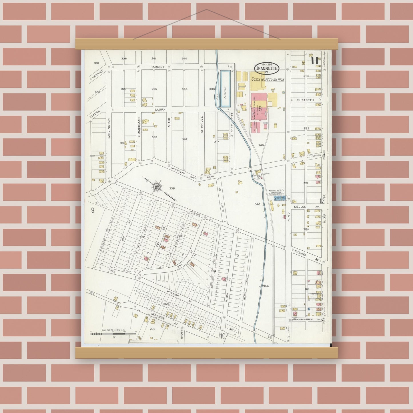 Old map wall art mockup — magnetic wood frame on brick wall — Sanborn Fire Insurance Map from Jeannette, Westmoreland County, Pennsylvania (1916), Sheet #0011