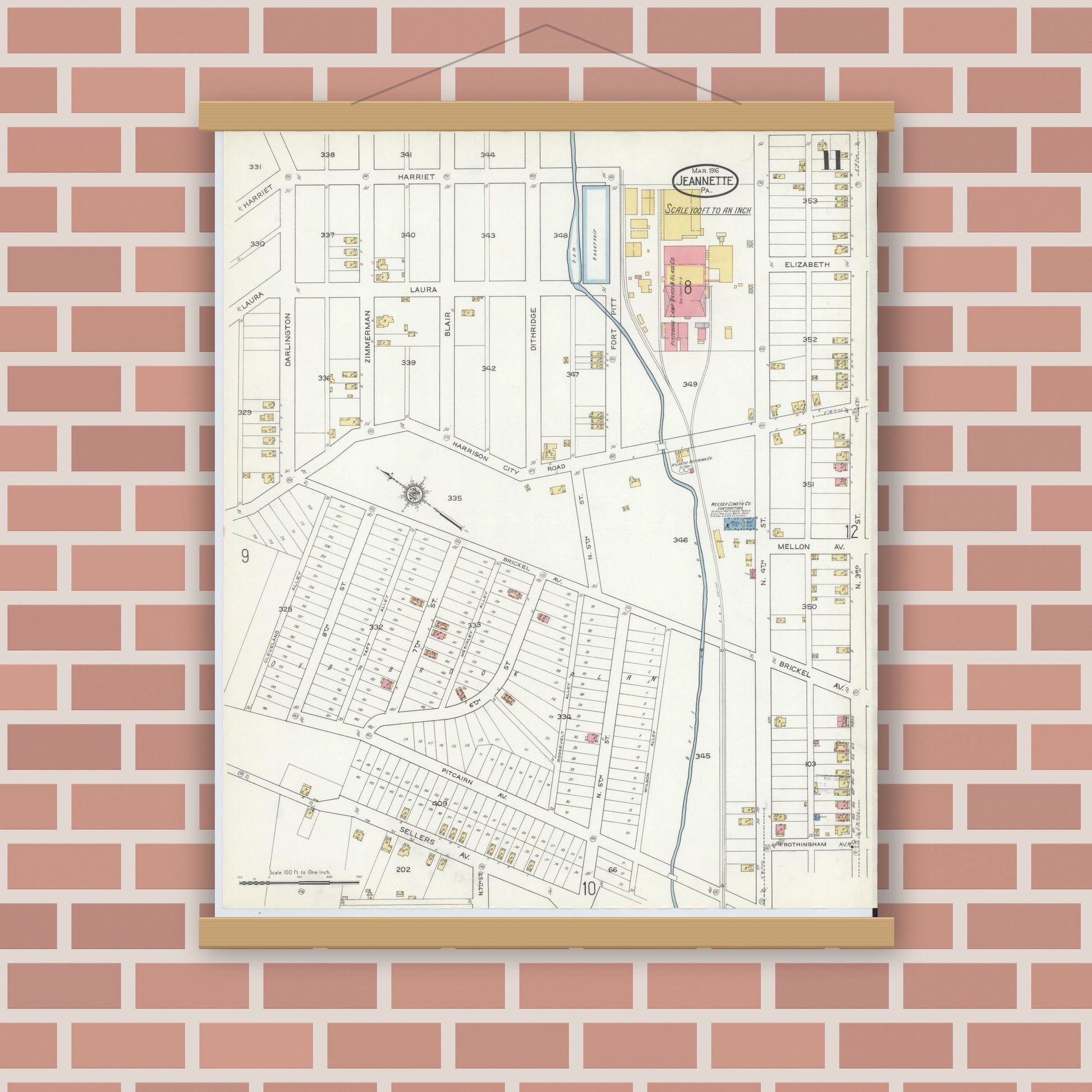 Old map wall art mockup — magnetic wood frame on brick wall — Sanborn Fire Insurance Map from Jeannette, Westmoreland County, Pennsylvania (1916), Sheet #0011