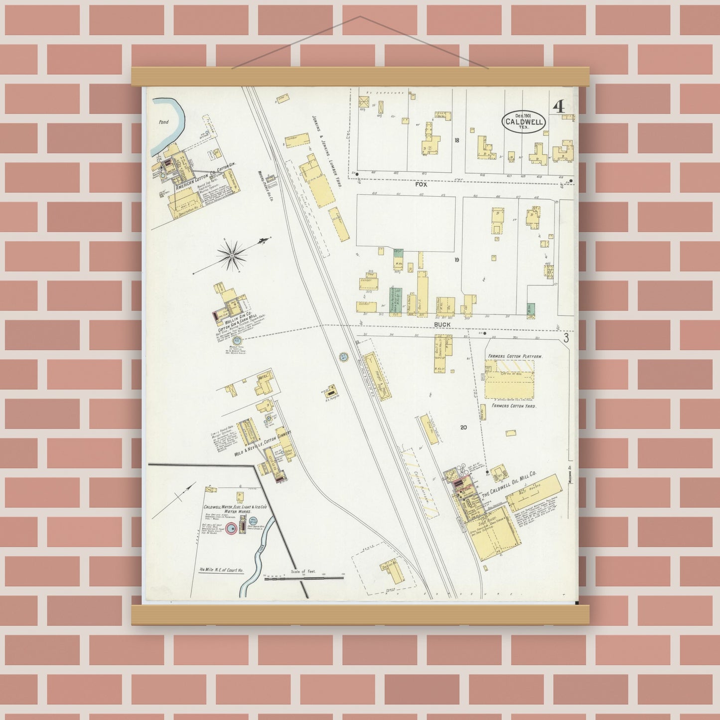 Old map wall art mockup — magnetic wood frame on brick wall — Sanborn Fire Insurance Map from Caldwell, Burleson County, Texas (1901), Sheet #0004