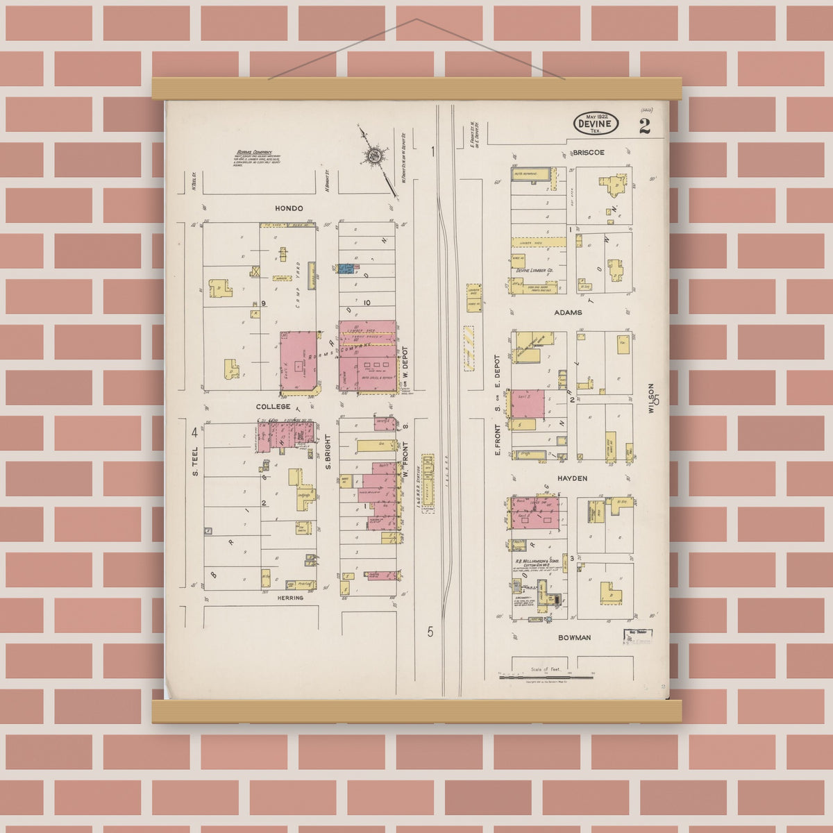 Old map wall art mockup — magnetic wood frame on brick wall — Sanborn Fire Insurance Map from Devine, Medina County, Texas (1922), Sheet #0002