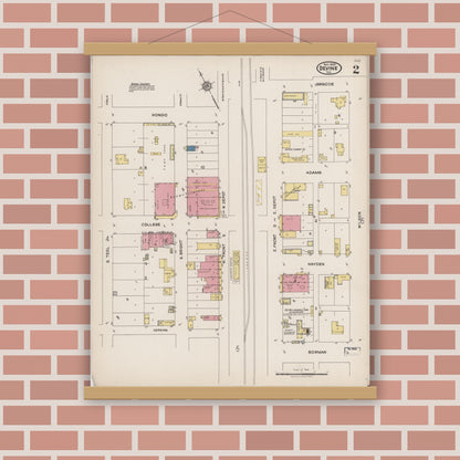 Old map wall art mockup — magnetic wood frame on brick wall — Sanborn Fire Insurance Map from Devine, Medina County, Texas (1922), Sheet #0002