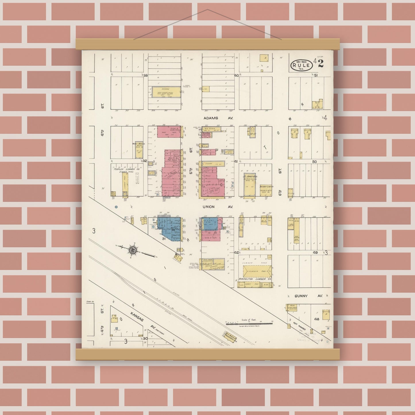 Old map wall art mockup — magnetic wood frame on brick wall — Sanborn Fire Insurance Map from Rule, Haskell County, Texas (1922), Sheet #0002
