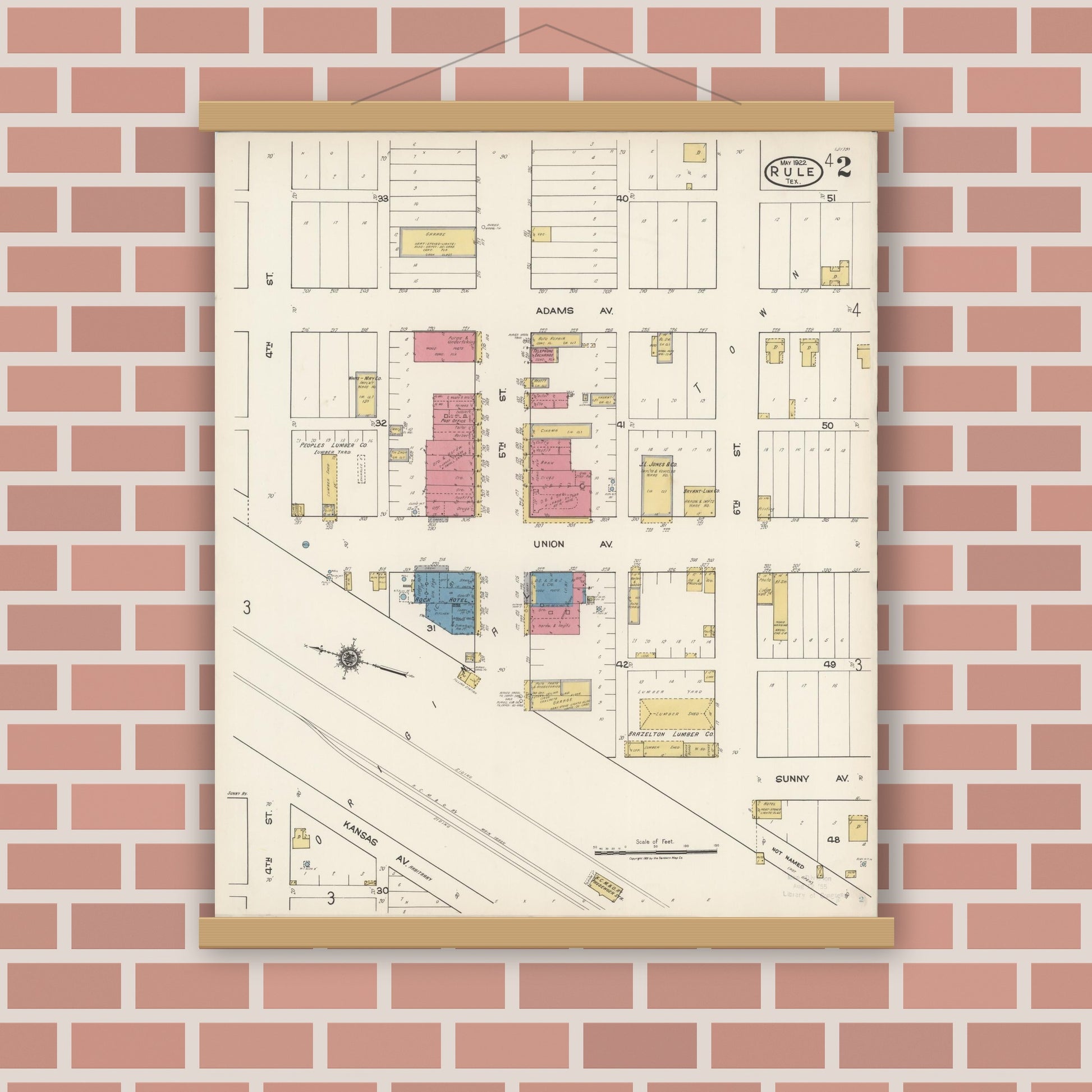 Old map wall art mockup — magnetic wood frame on brick wall — Sanborn Fire Insurance Map from Rule, Haskell County, Texas (1922), Sheet #0002