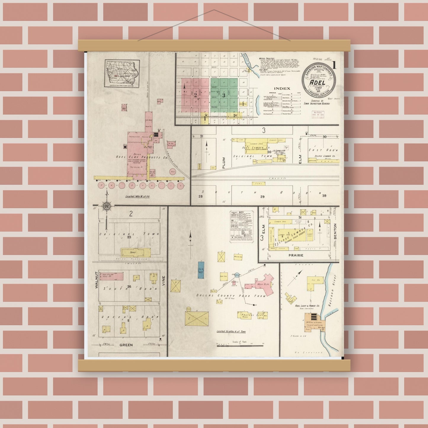 Old map wall art mockup — magnetic wood frame on brick wall — Sanborn Fire Insurance Map from Adel, Dallas County, Iowa (1915) â€” Complete Set