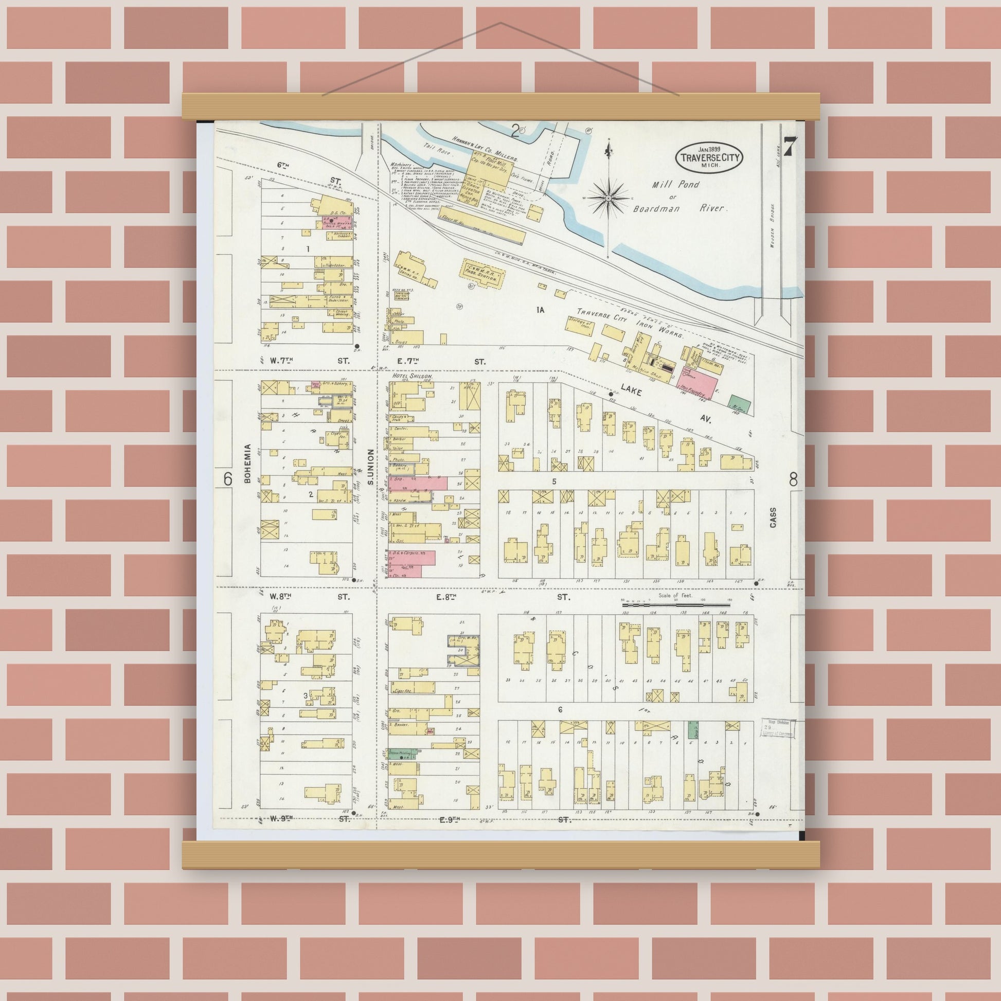 Old map wall art mockup — magnetic wood frame on brick wall — Sanborn Fire Insurance Map from Traverse City, Grand Traverse County, Michigan (1899), Sheet #0007
