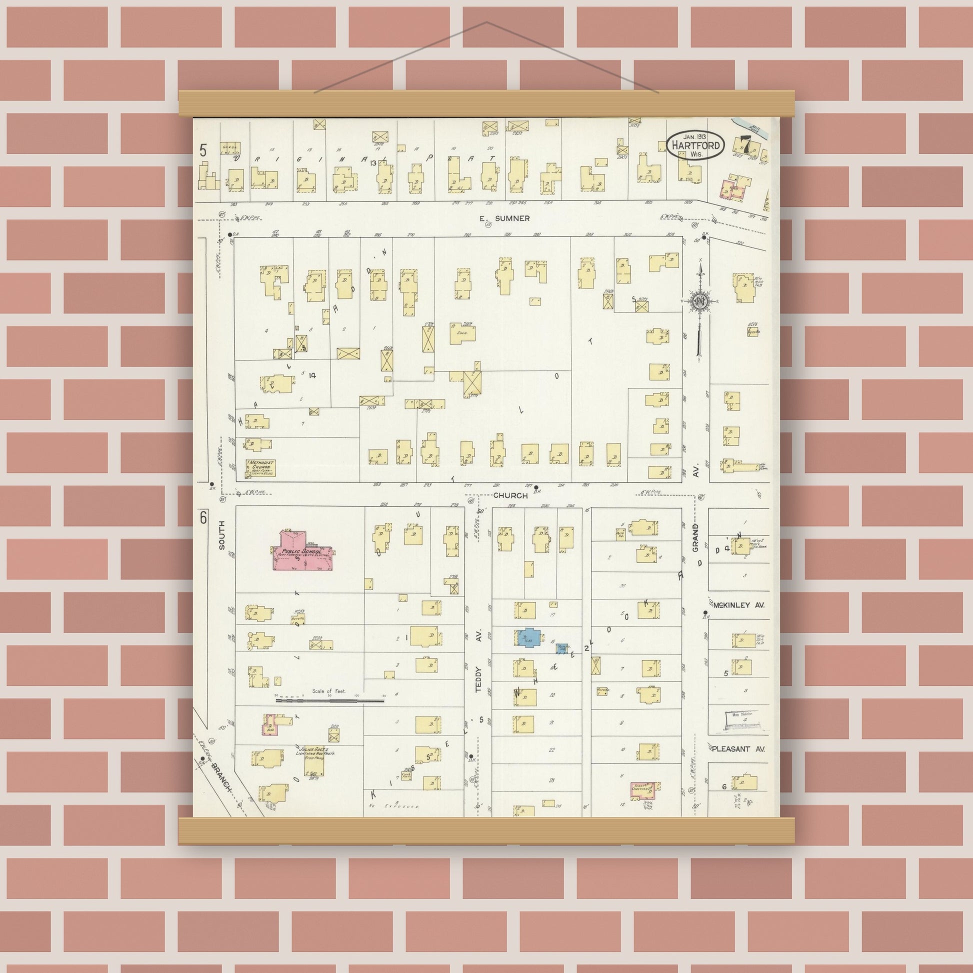 Old map wall art mockup — magnetic wood frame on brick wall — Sanborn Fire Insurance Map from Hartford, Washington County, Wisconsin (1913), Sheet #0007