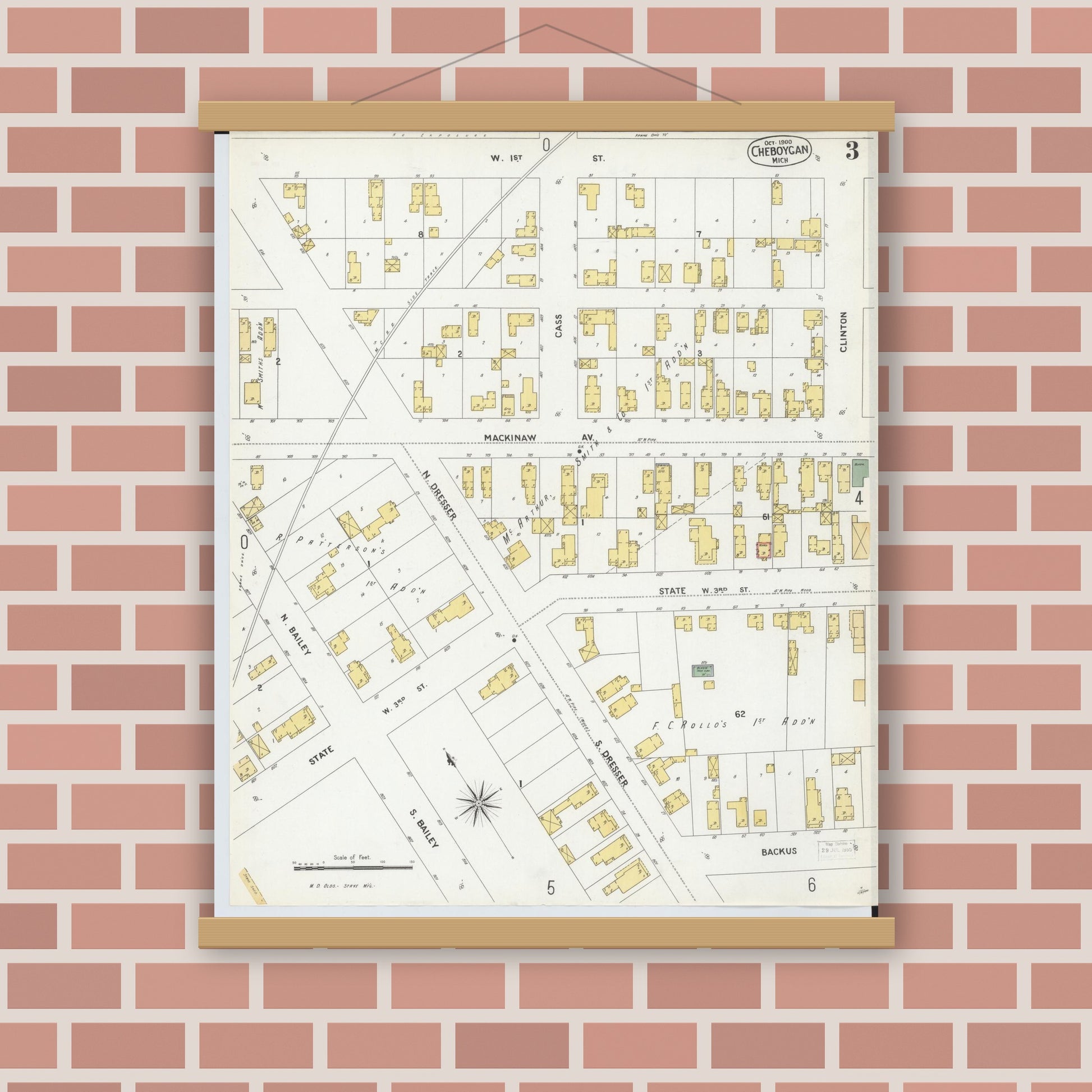 Old map wall art mockup — magnetic wood frame on brick wall — Sanborn Fire Insurance Map from Cheboygan, Cheboygan County, Michigan (1900), Sheet #0003