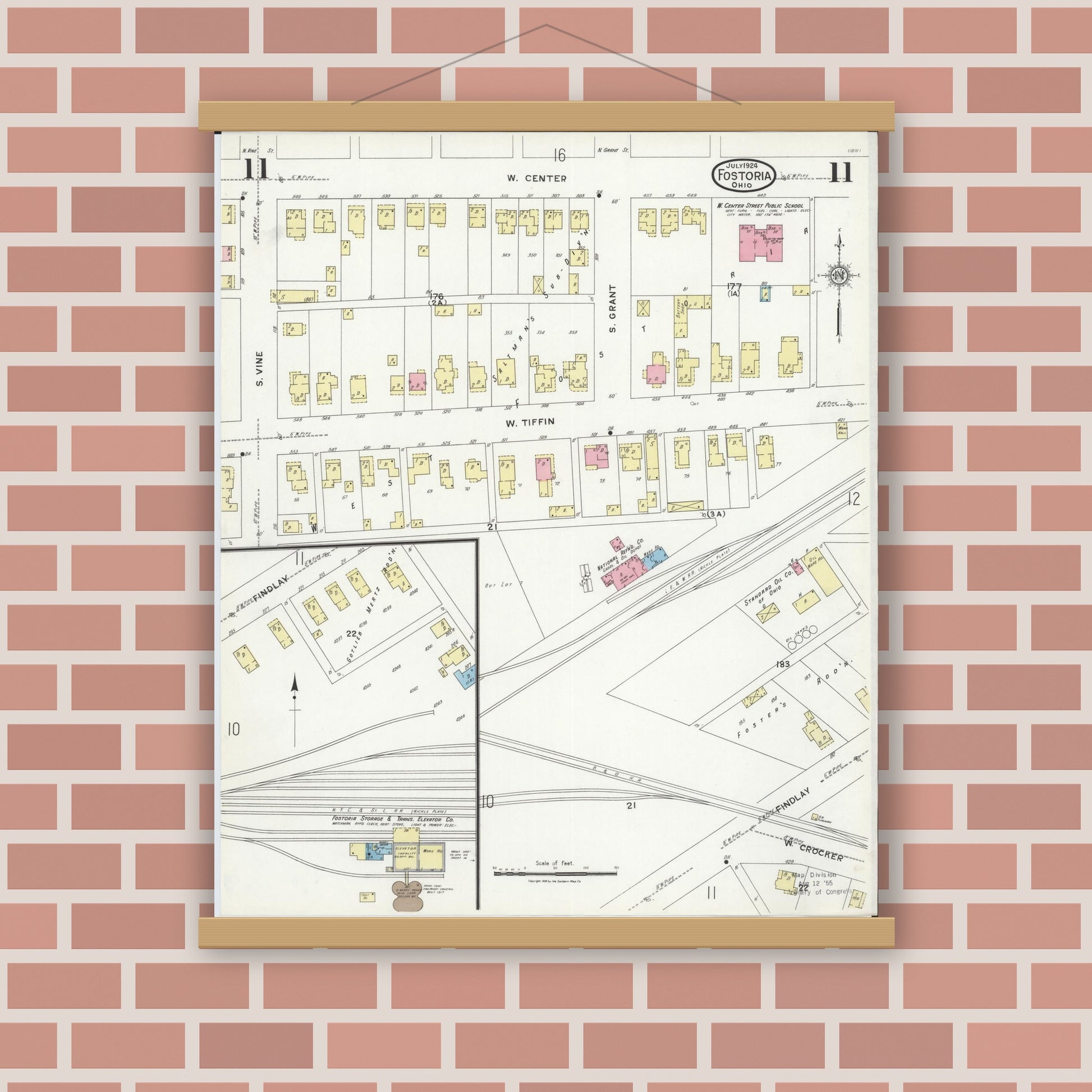 Old map wall art mockup — magnetic wood frame on brick wall — Sanborn Fire Insurance Map from Fostoria, Seneca, Hancock, And Wood Counties, Ohio (1924), Sheet #0011
