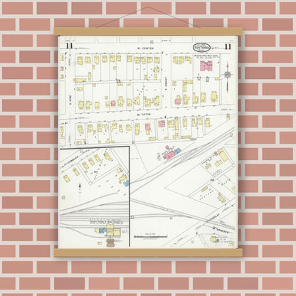 Old map wall art mockup — magnetic wood frame on brick wall — Sanborn Fire Insurance Map from Fostoria, Seneca, Hancock, And Wood Counties, Ohio (1924), Sheet #0011