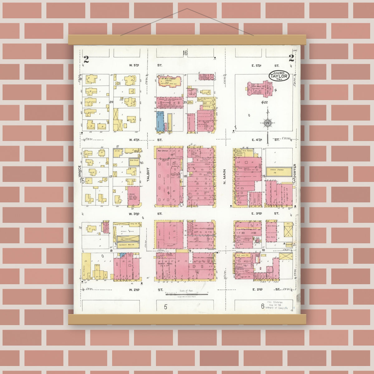 Old map wall art mockup — magnetic wood frame on brick wall — Sanborn Fire Insurance Map from Taylor, Williamson County, Texas (1923), Sheet #0002