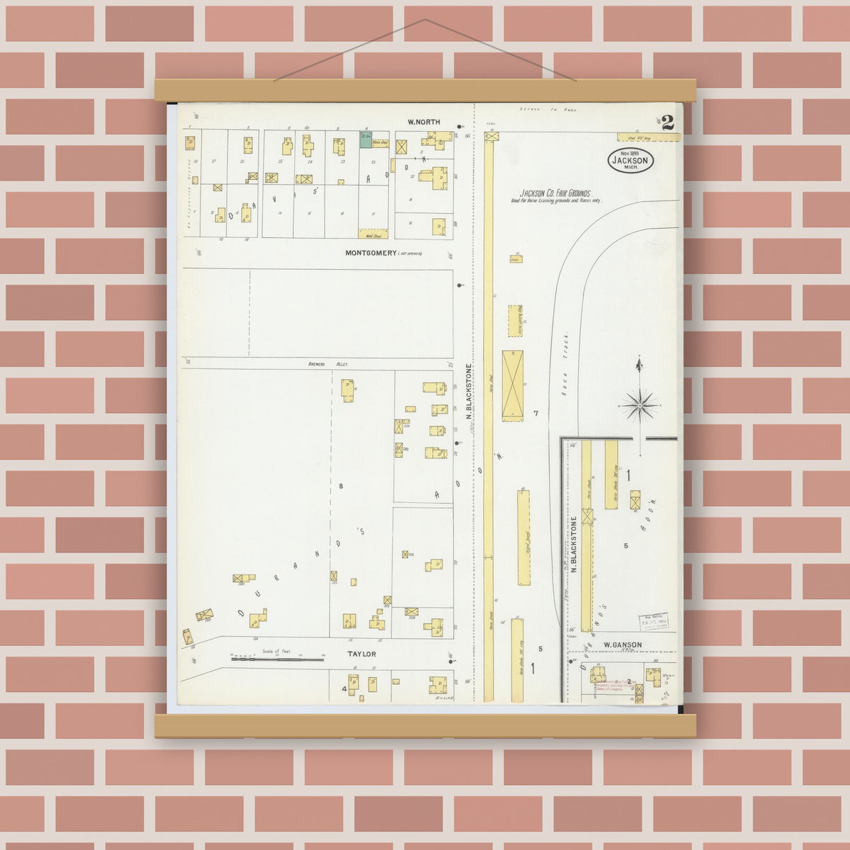 Old map wall art mockup — magnetic wood frame on brick wall — Sanborn Fire Insurance Map from Jackson, Jackson County, Michigan (1899), Sheet #0002