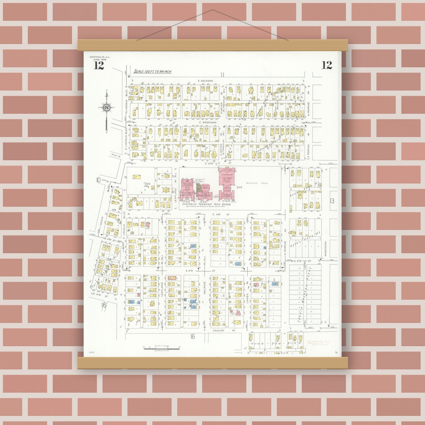 Old map wall art mockup — magnetic wood frame on brick wall — Sanborn Fire Insurance Map from Centralia, Marion, Clinton, Jefferson, and Washington Counties, Illinois (1938), Sheet #0012