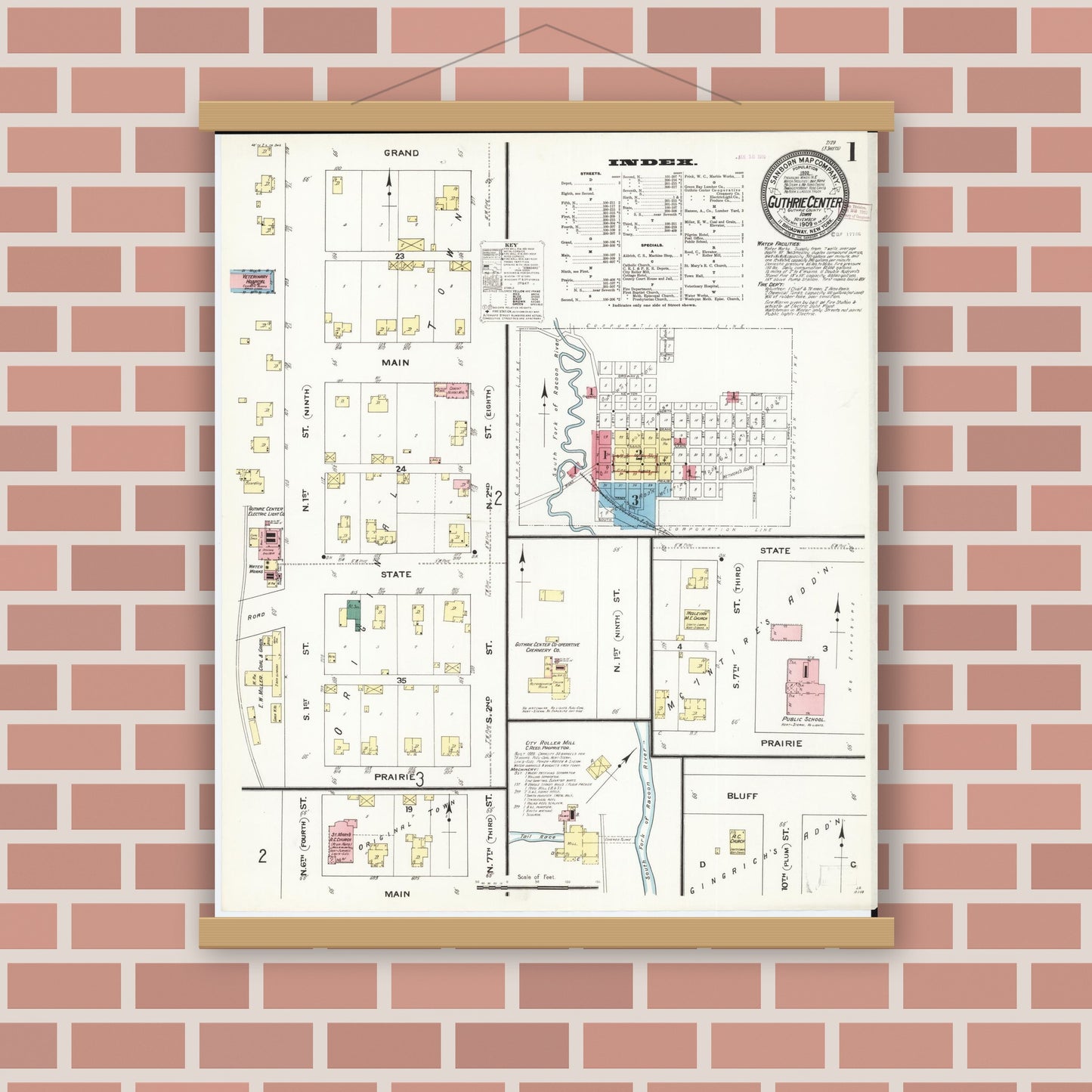 Old map wall art mockup — magnetic wood frame on brick wall — Sanborn Fire Insurance Map from Guthrie Center, Guthrie County, Iowa (1909) â€” Complete Set