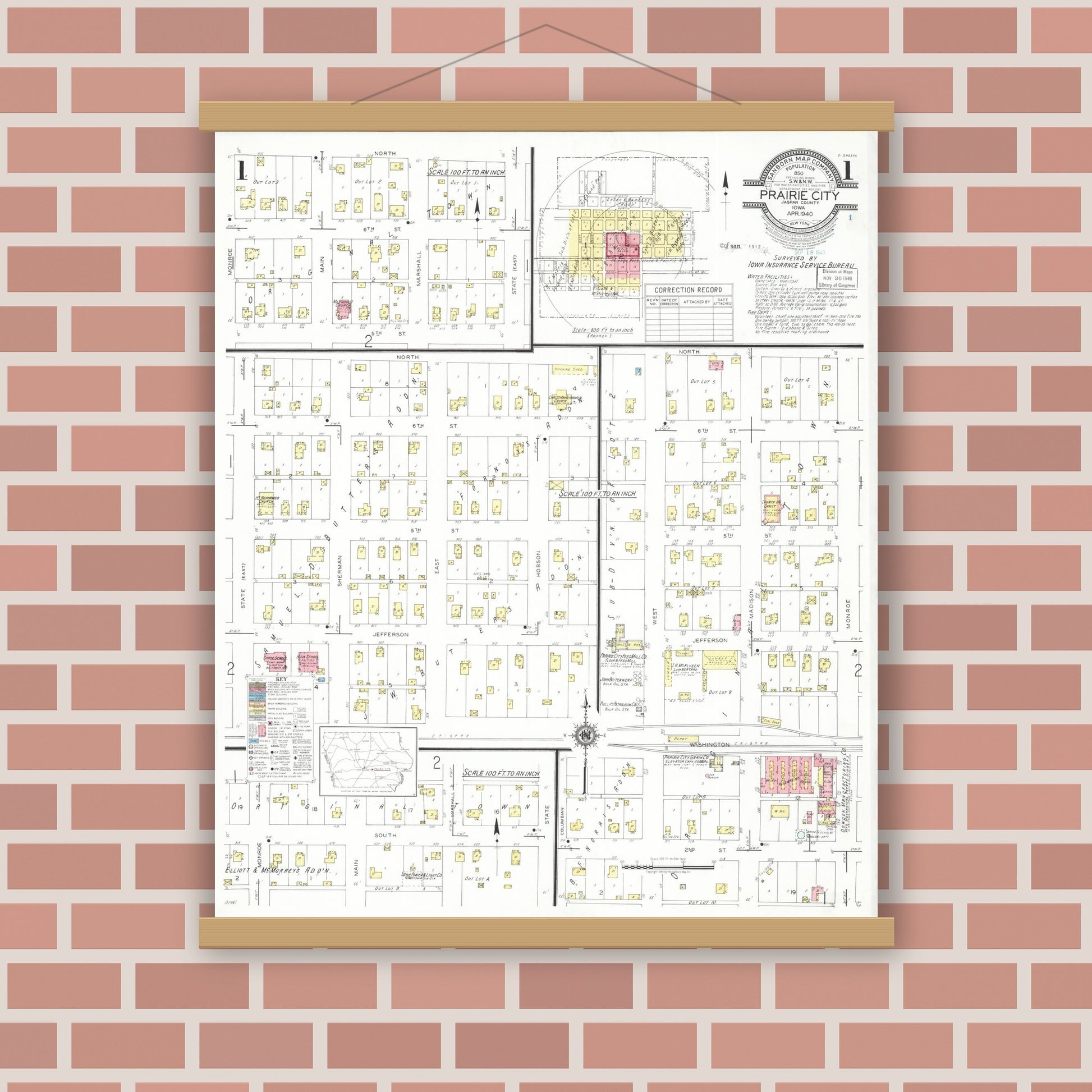 Old map wall art mockup — magnetic wood frame on brick wall — Sanborn Fire Insurance Map from Prairie City, Jasper County, Iowa (1940), Sheet #0001