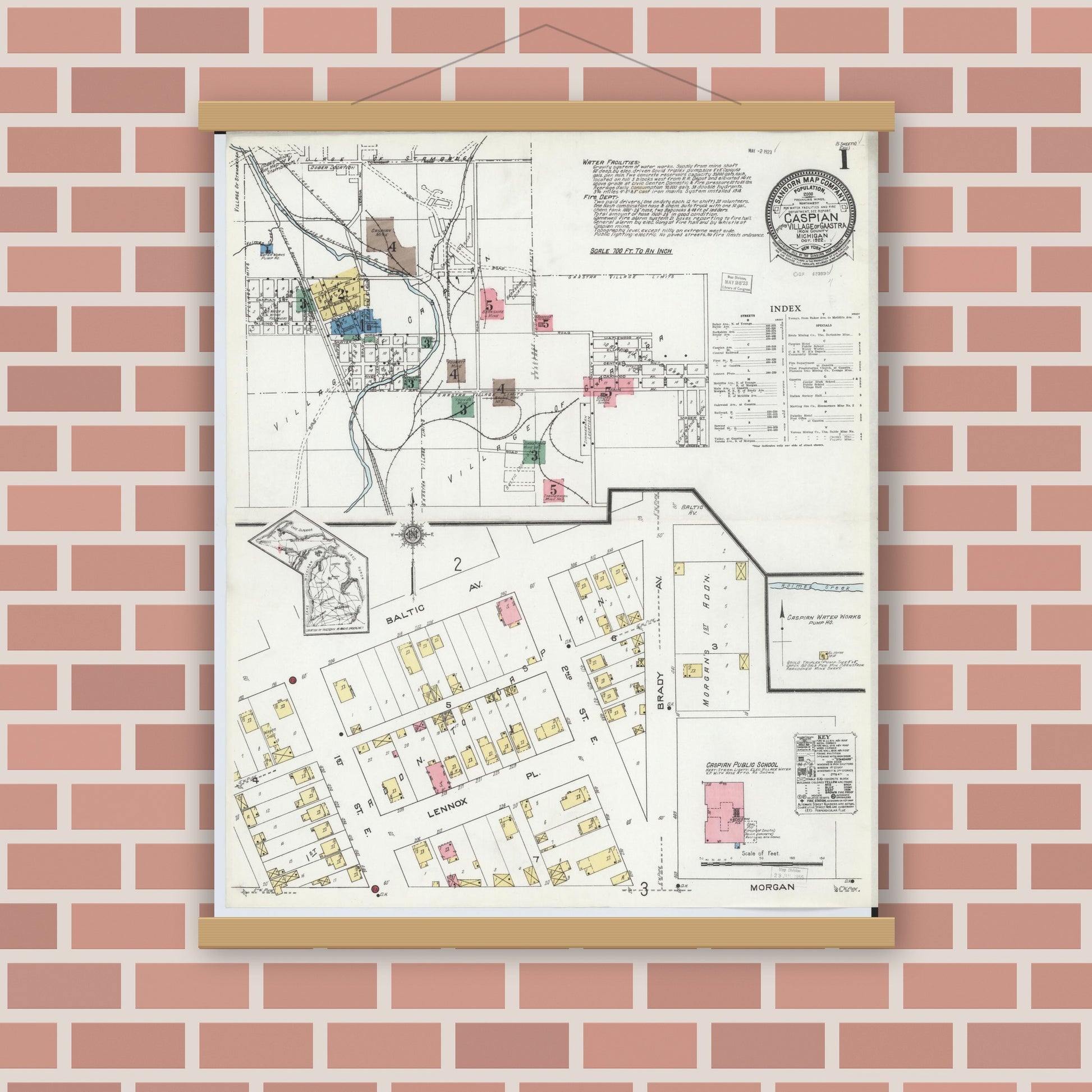 Old map wall art mockup — magnetic wood frame on brick wall — Sanborn Fire Insurance Map from Caspian, Iron County, Michigan (1922) - Complete Map Set