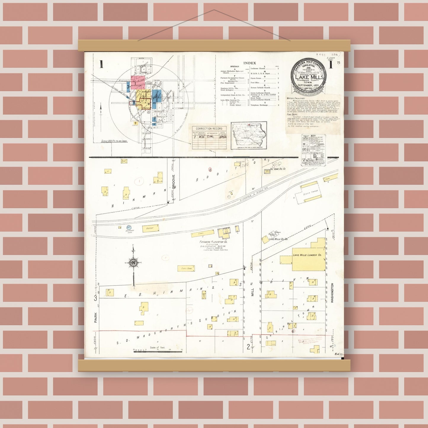 Old map wall art mockup — magnetic wood frame on brick wall — Sanborn Fire Insurance Map from Lake Mills, Winnebago County, Iowa (1935), Sheet #0001