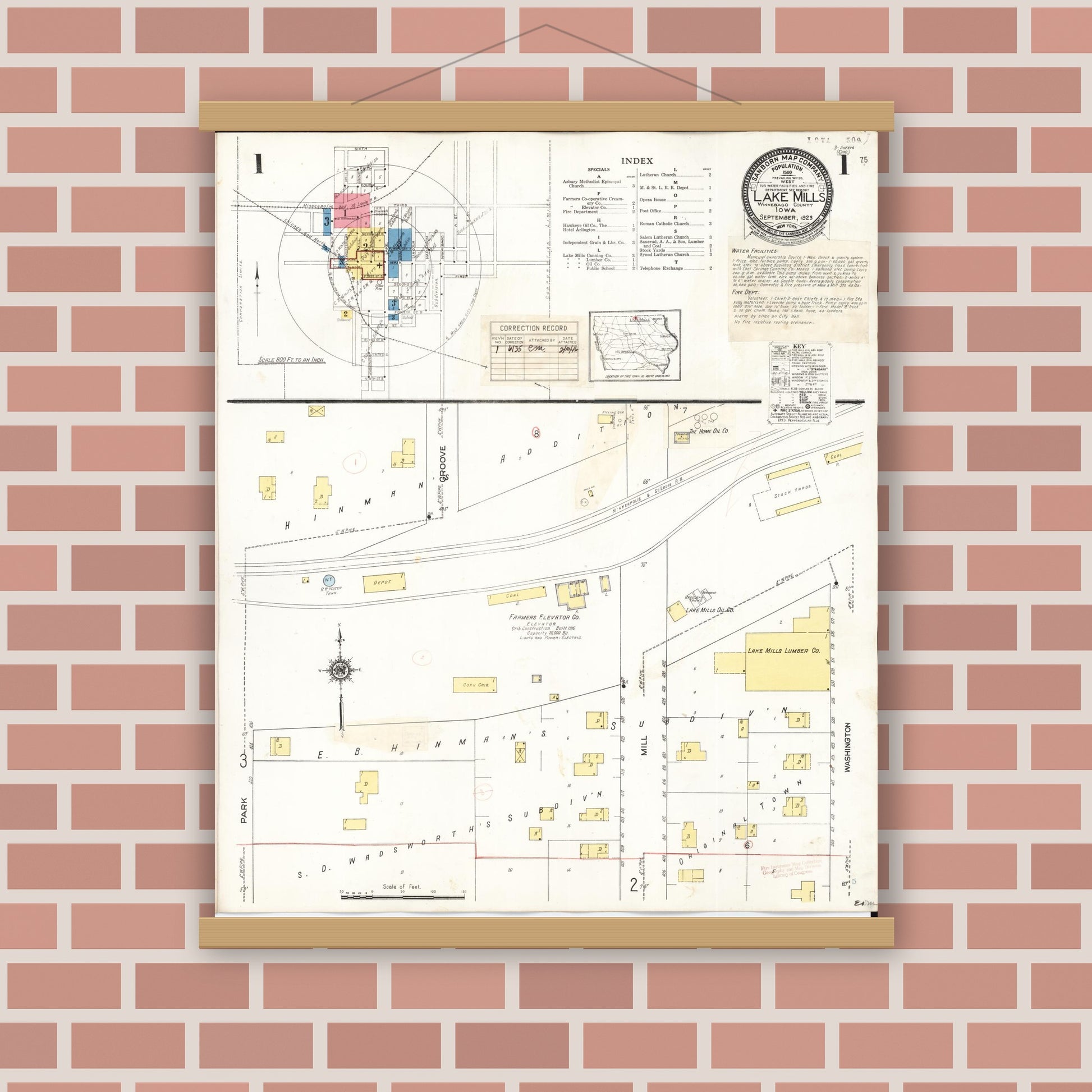 Old map wall art mockup — magnetic wood frame on brick wall — Sanborn Fire Insurance Map from Lake Mills, Winnebago County, Iowa (1935), Sheet #0001