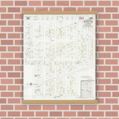 Old map wall art mockup — magnetic wood frame on brick wall — Sanborn Fire Insurance Map from Iron Mountain, Dickinson County, Michigan (1930), Sheet #0039