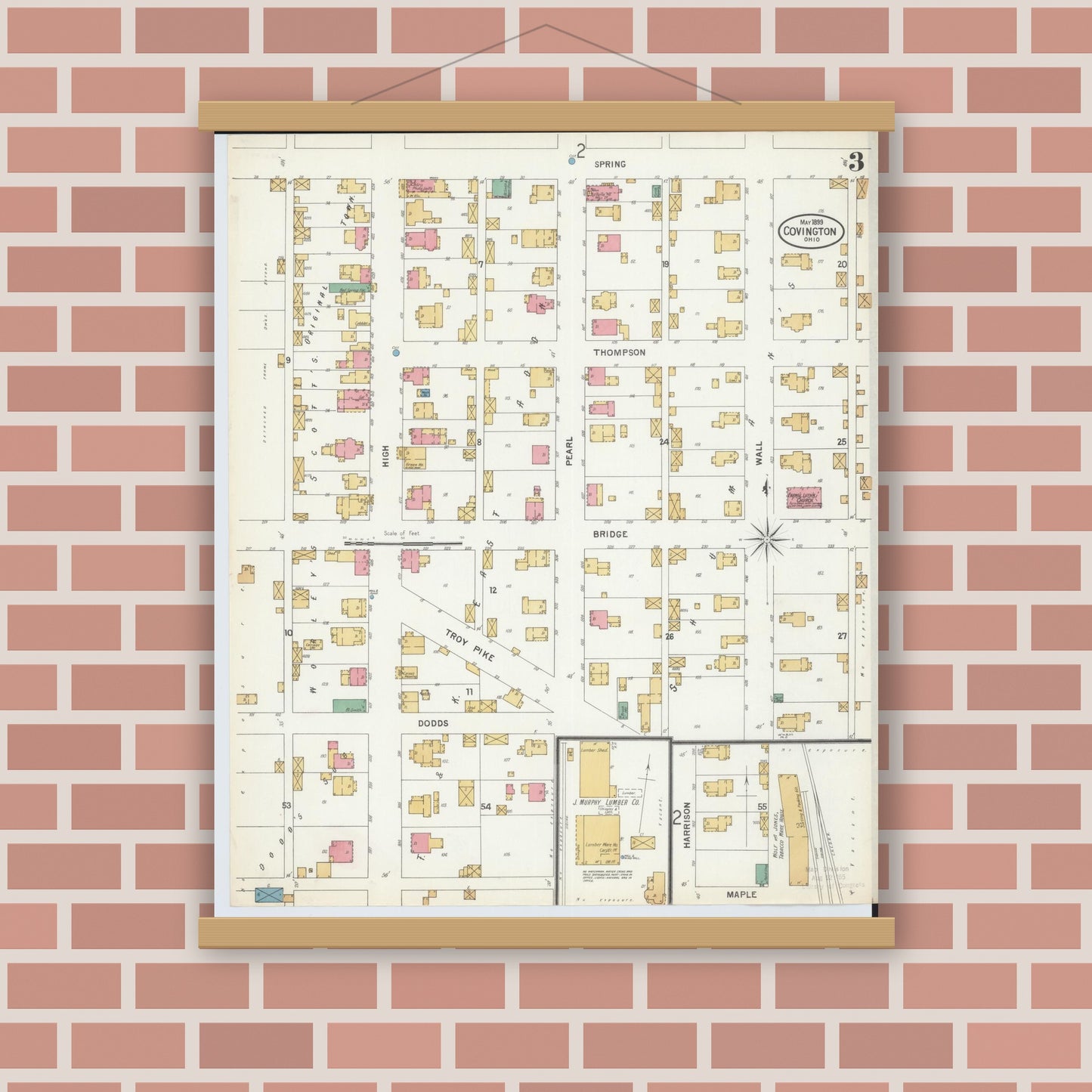 Old map wall art mockup — magnetic wood frame on brick wall — Sanborn Fire Insurance Map from Covington, Miami County, Ohio (1899), Sheet #0003