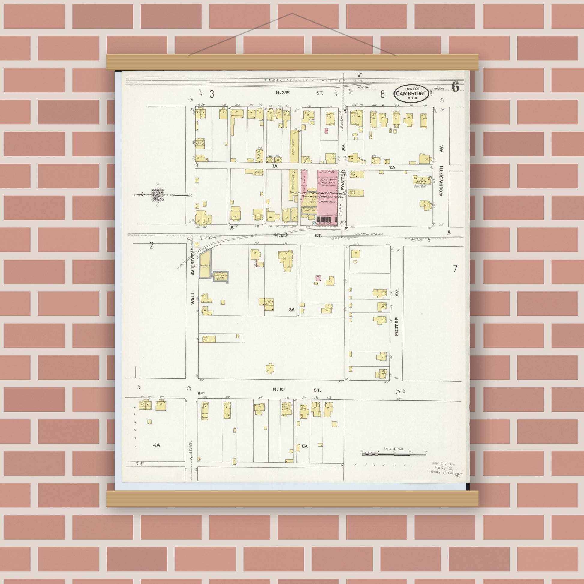 Old map wall art mockup — magnetic wood frame on brick wall — Sanborn Fire Insurance Map from Cambridge, Guernsey County, Ohio (1909), Sheet #0006