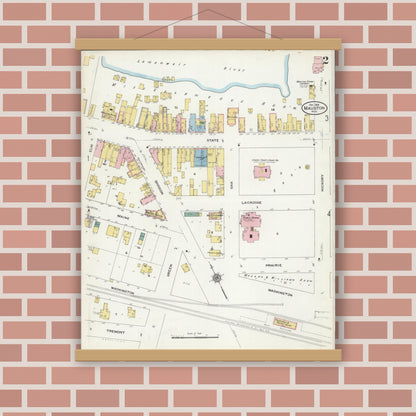 Old map wall art mockup — magnetic wood frame on brick wall — Sanborn Fire Insurance Map from Mauston, Juneau County, Wisconsin (1909), Sheet #0002