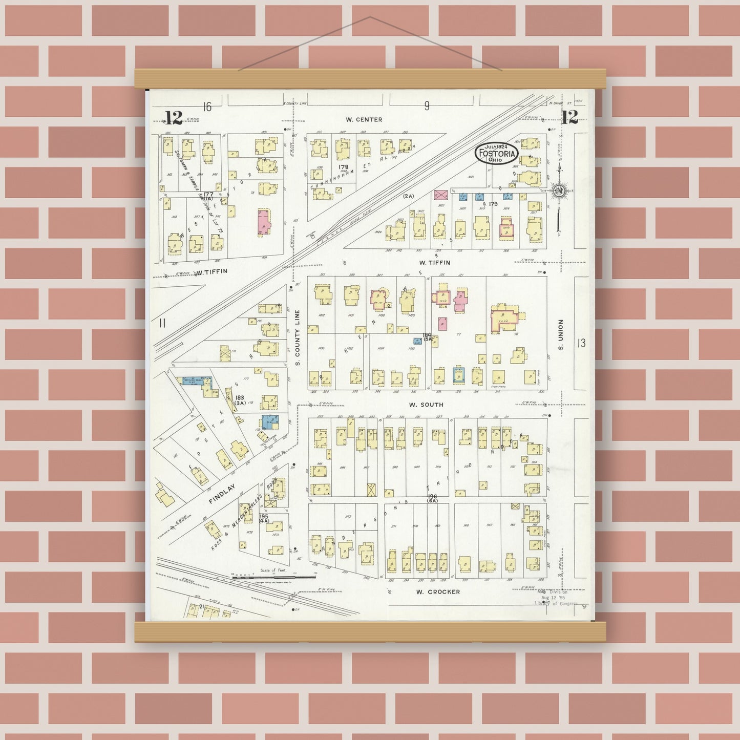 Old map wall art mockup — magnetic wood frame on brick wall — Sanborn Fire Insurance Map from Fostoria, Seneca, Hancock, And Wood Counties, Ohio (1924), Sheet #0012