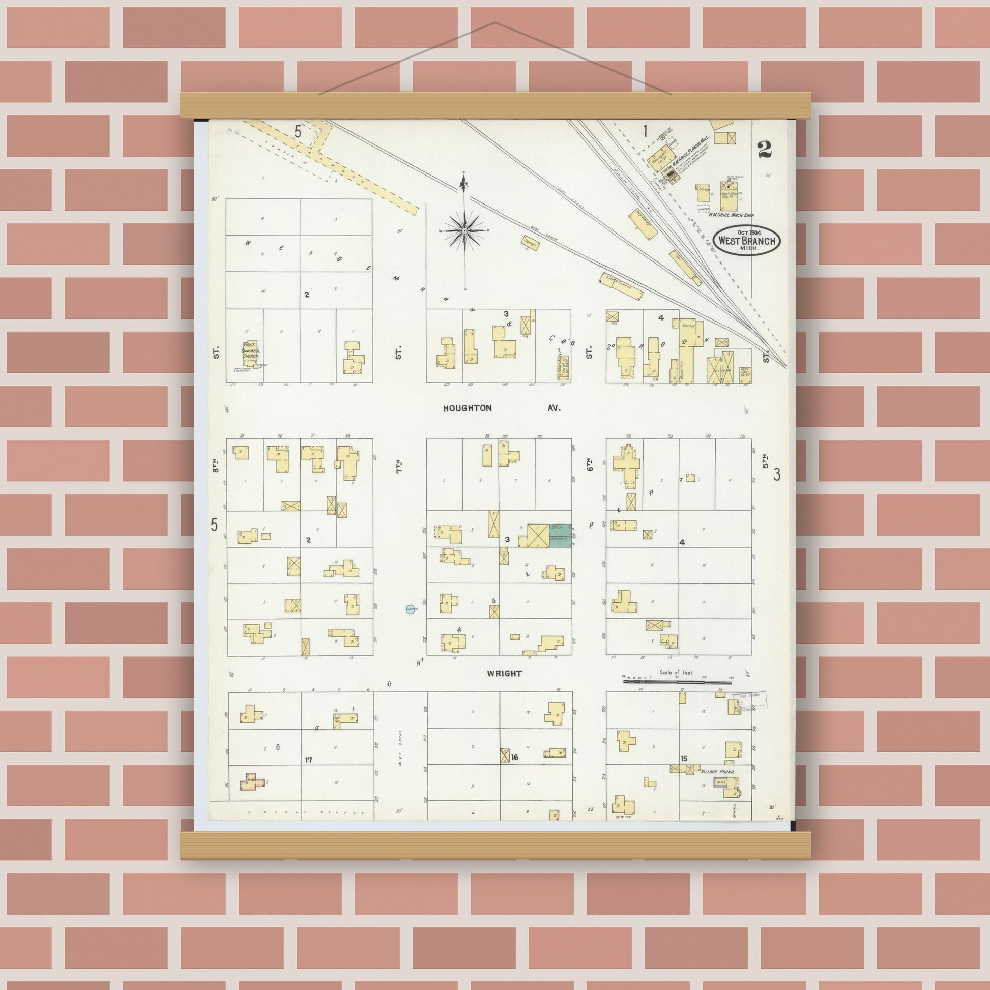 Old map wall art mockup — magnetic wood frame on brick wall — Sanborn Fire Insurance Map from West Branch, Ogemaw County, Michigan (1904), Sheet #0002