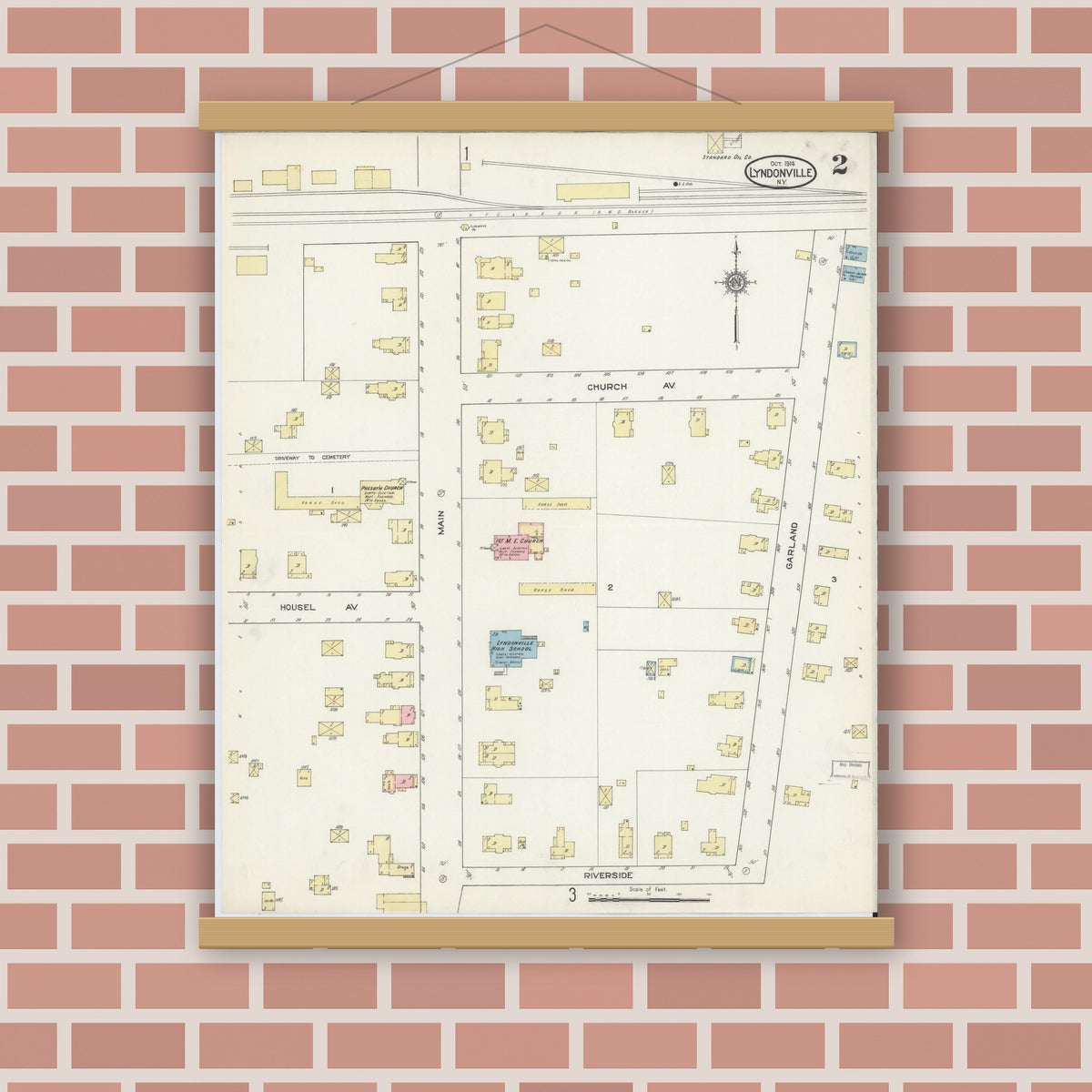 Old map wall art mockup — magnetic wood frame on brick wall — Sanborn Fire Insurance Map from Lyndonville, Orleans County, New York (1914), Sheet #0002