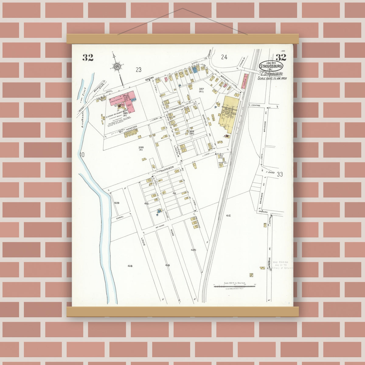 Old map wall art mockup — magnetic wood frame on brick wall — Sanborn Fire Insurance Map from Stroudsburg, Monroe County, Pennsylvania (1923), Sheet #0032
