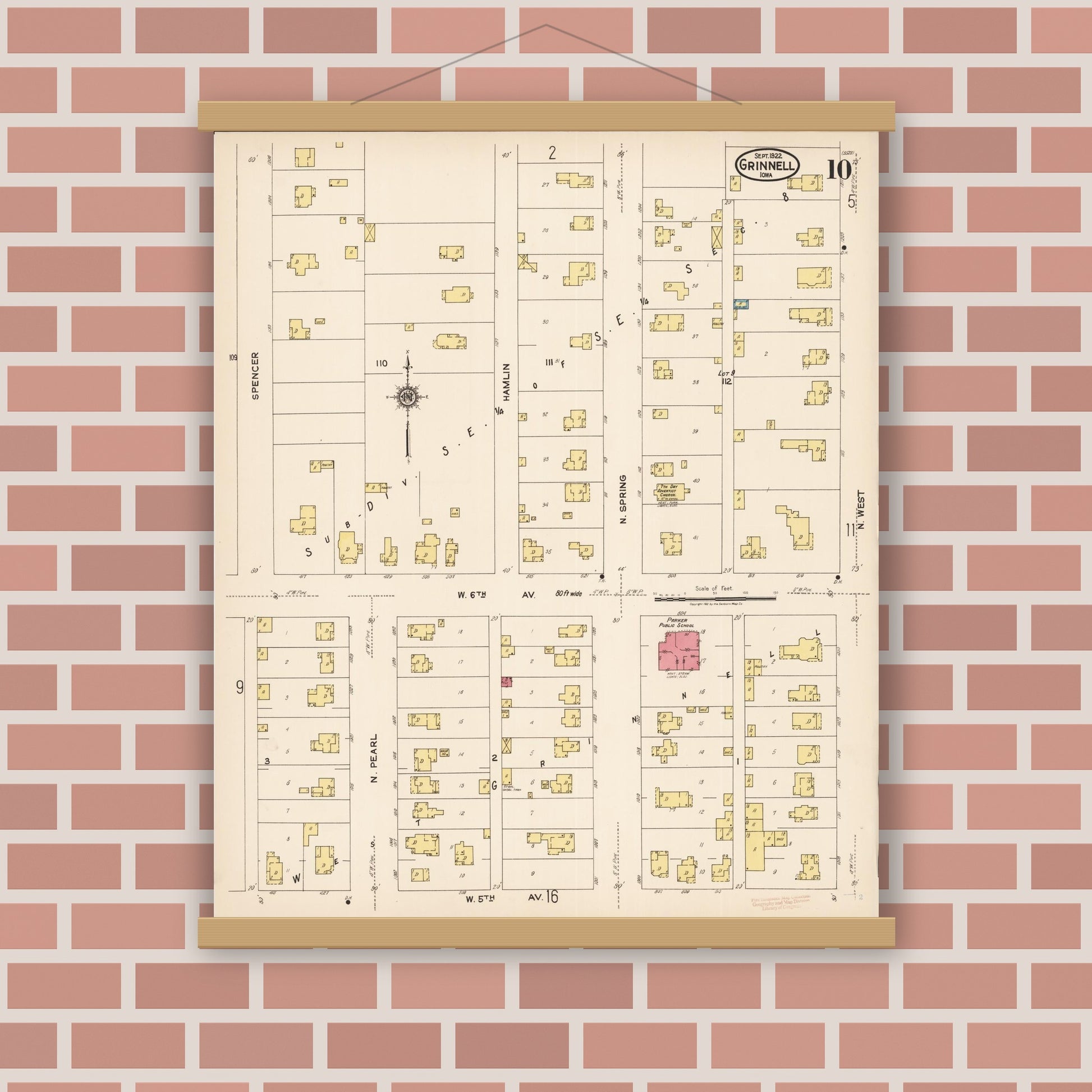 Old map wall art mockup — magnetic wood frame on brick wall — Sanborn Fire Insurance Map from Grinnell, Poweshiek County, Iowa (1922), Sheet #0010